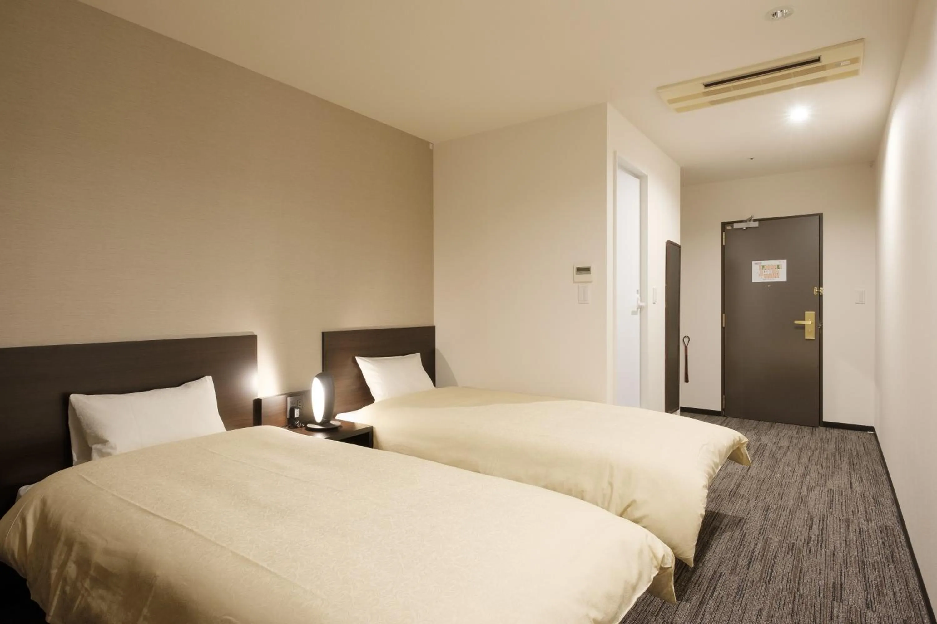 Bed in The Premium Hotel In Rinku