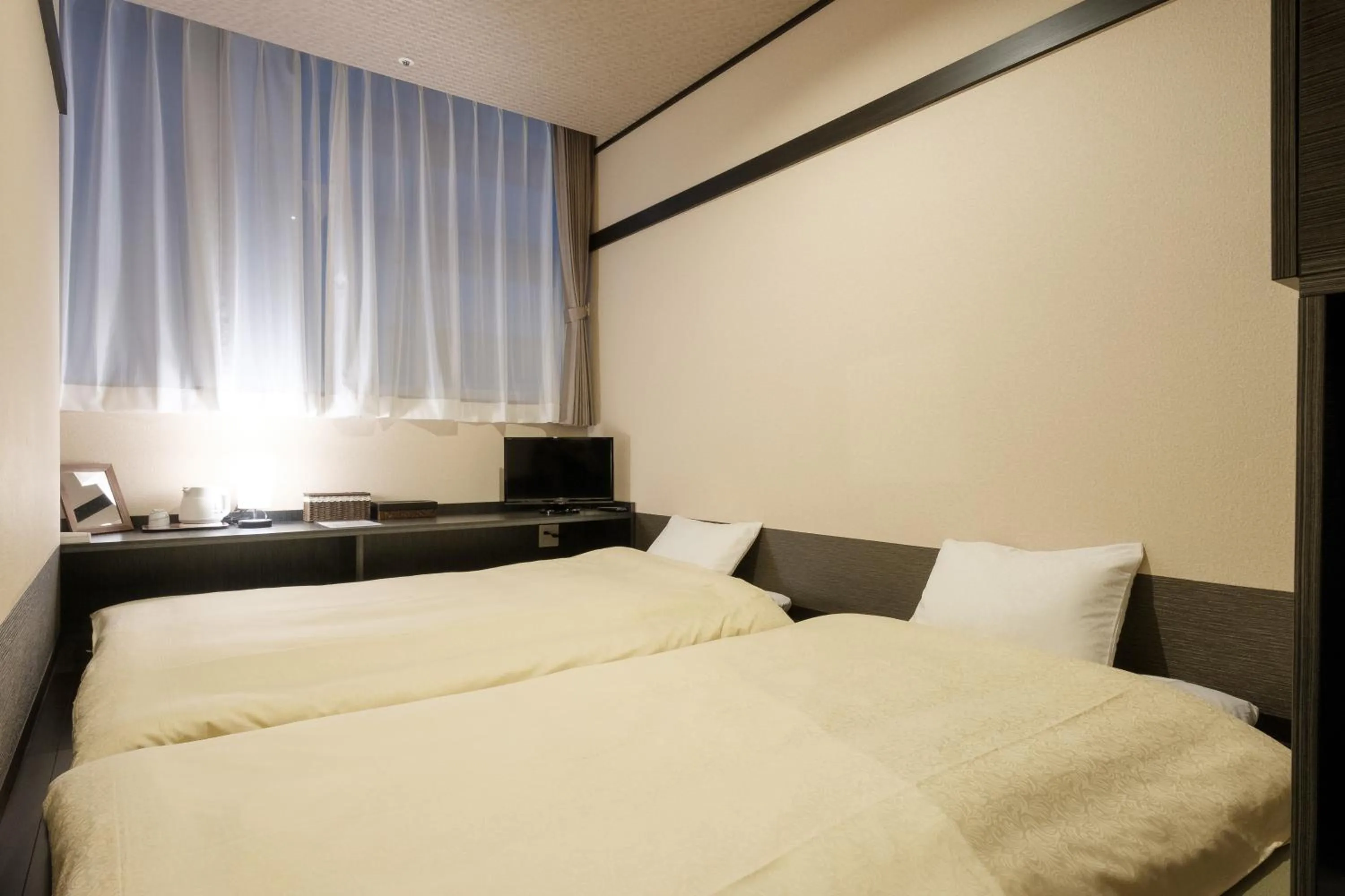 Photo of the whole room, Bed in The Premium Hotel In Rinku