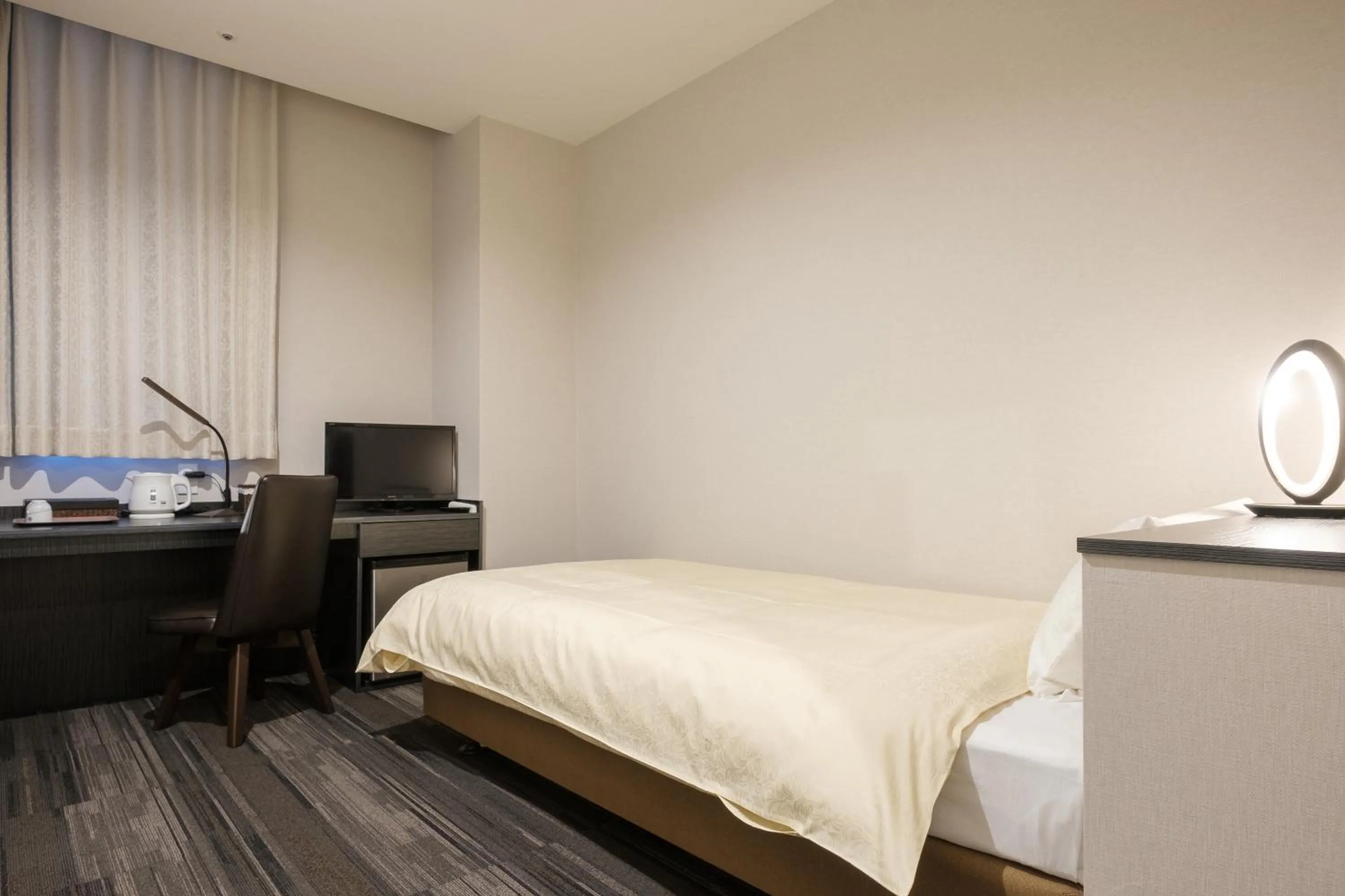 Bed in The Premium Hotel In Rinku