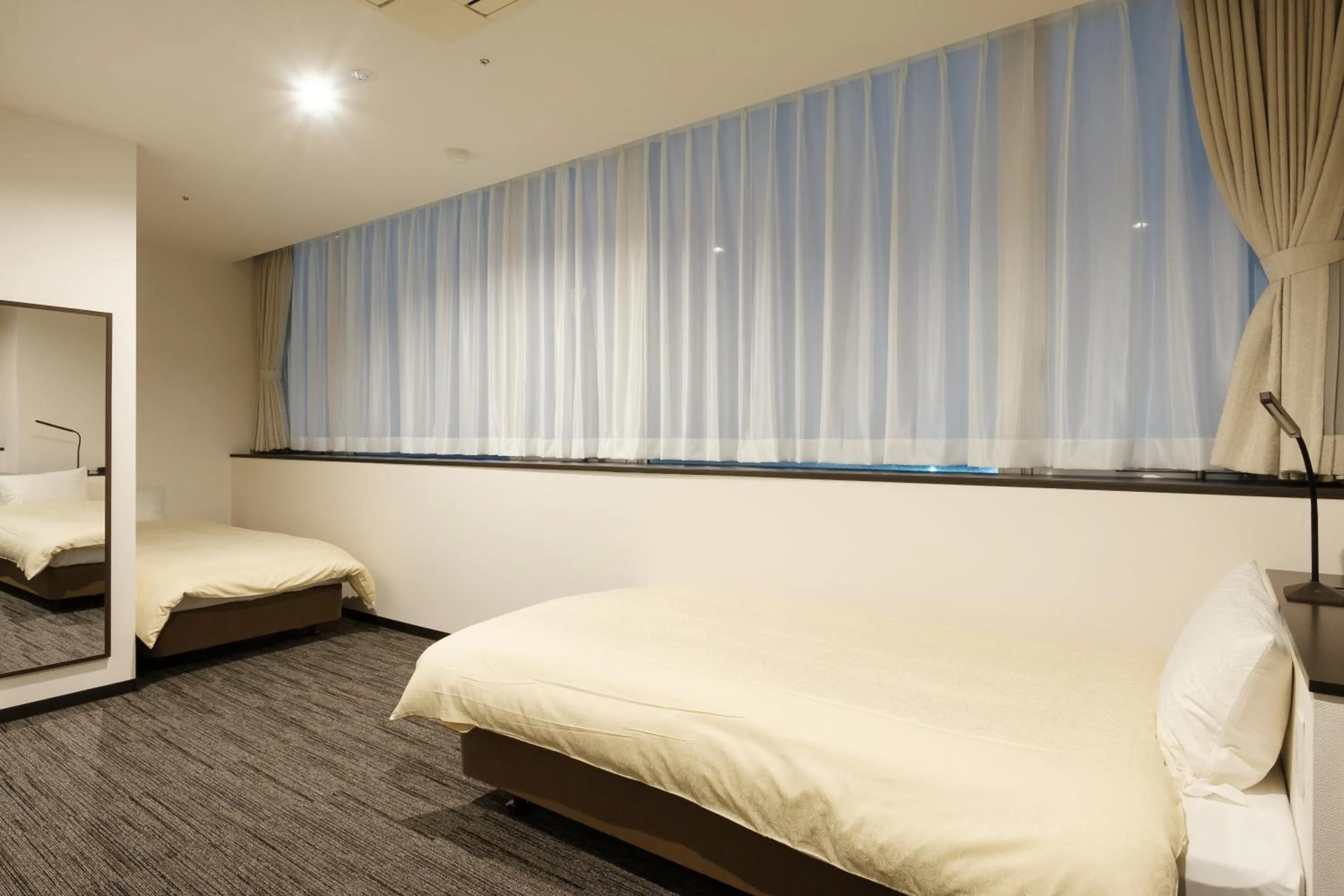 Photo of the whole room, Bed in The Premium Hotel In Rinku