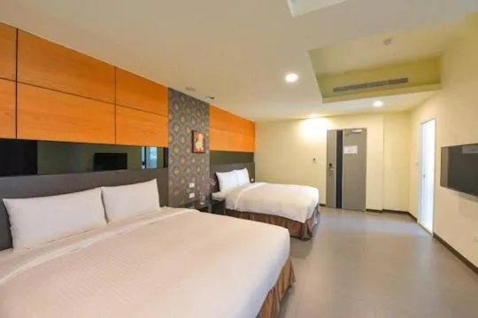 Bed in San Juan Easy Stay Inn Tainan