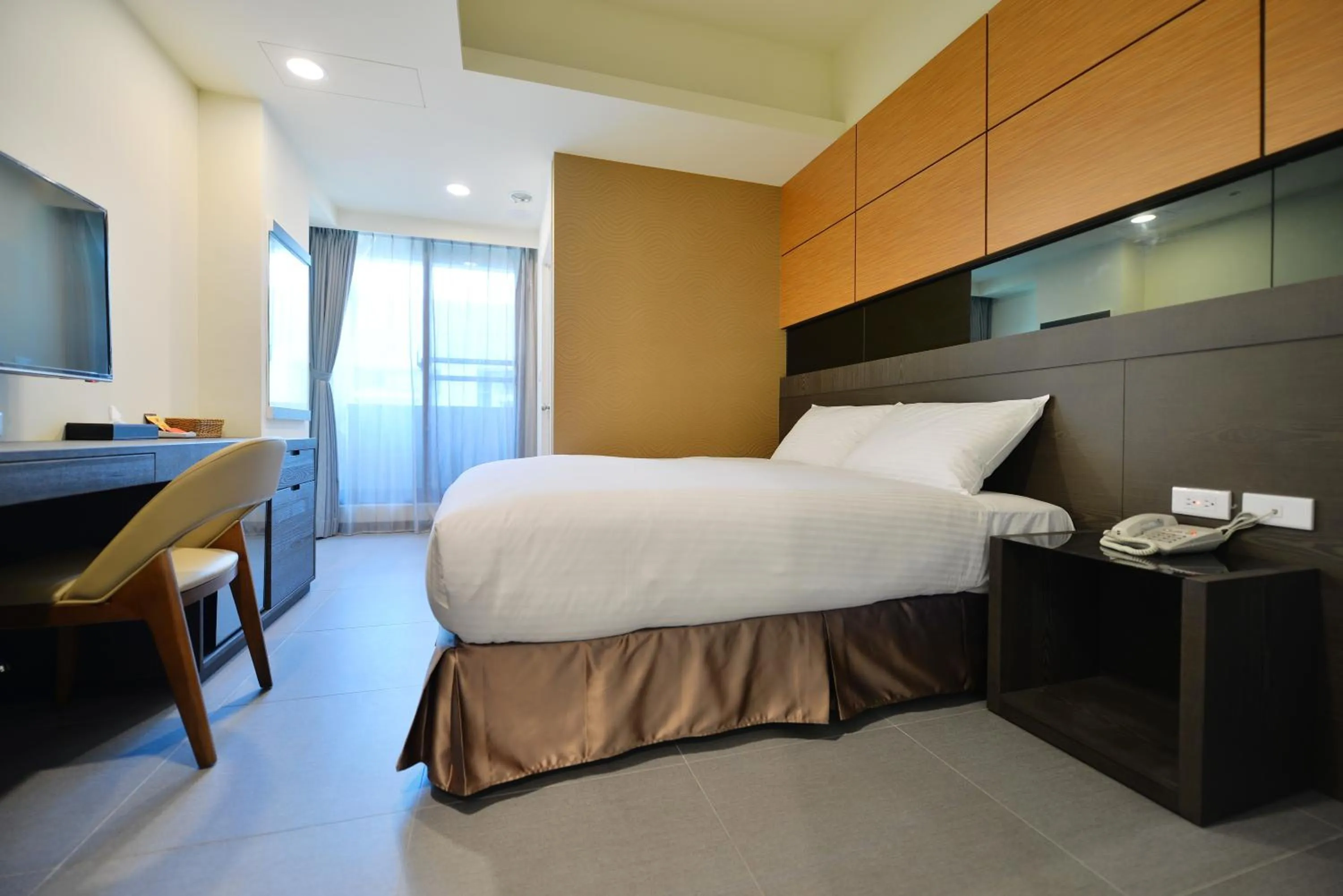 Bed in San Juan Easy Stay Inn Tainan