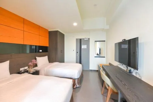 Bed in San Juan Easy Stay Inn Tainan