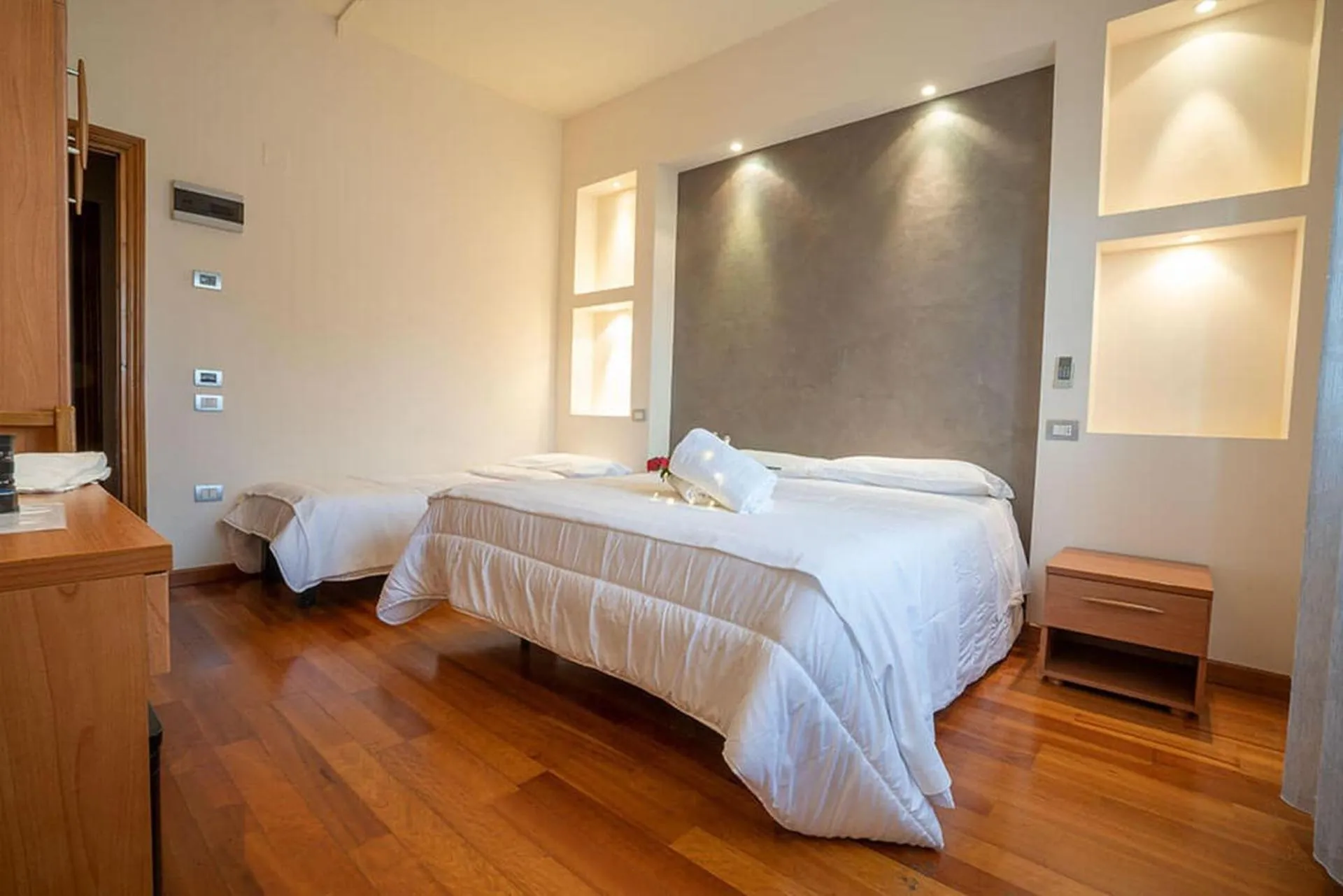 Bed in Le Grazie Hotel