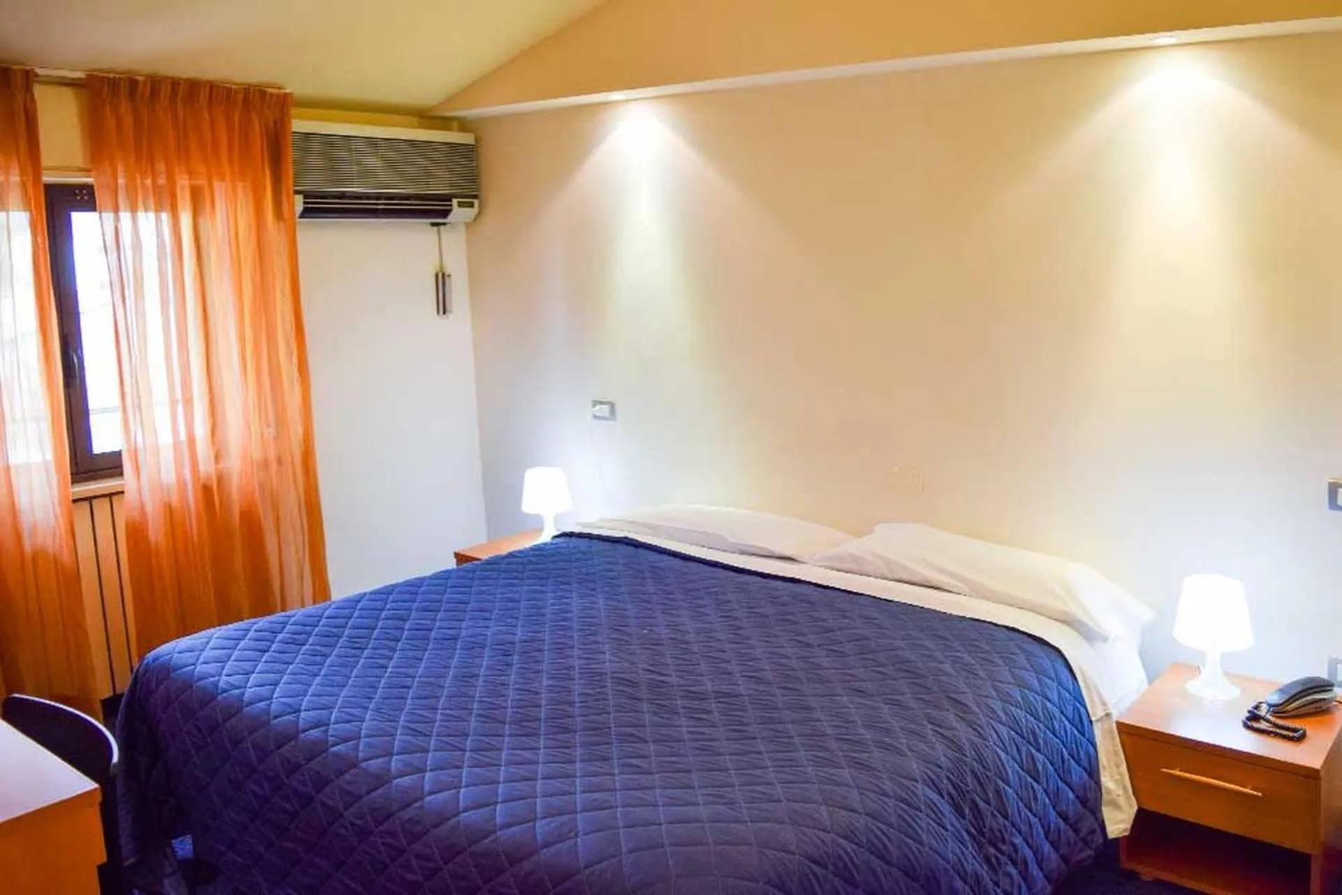 Bed in Le Grazie Hotel