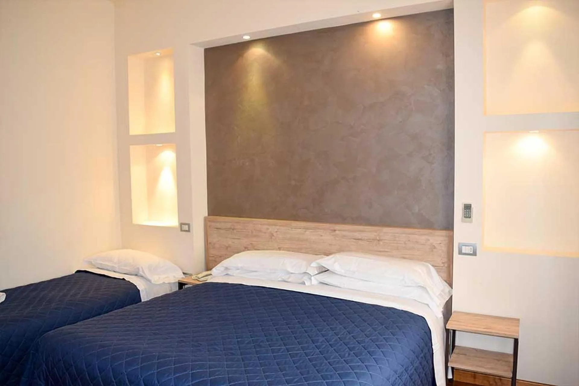 Bed in Le Grazie Hotel