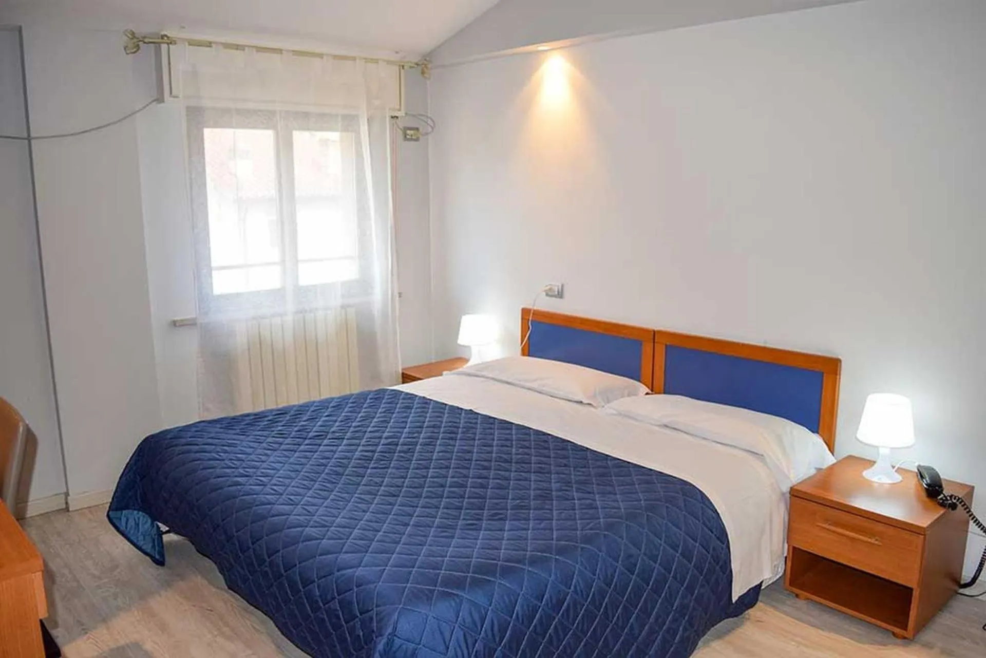 Bed in Le Grazie Hotel