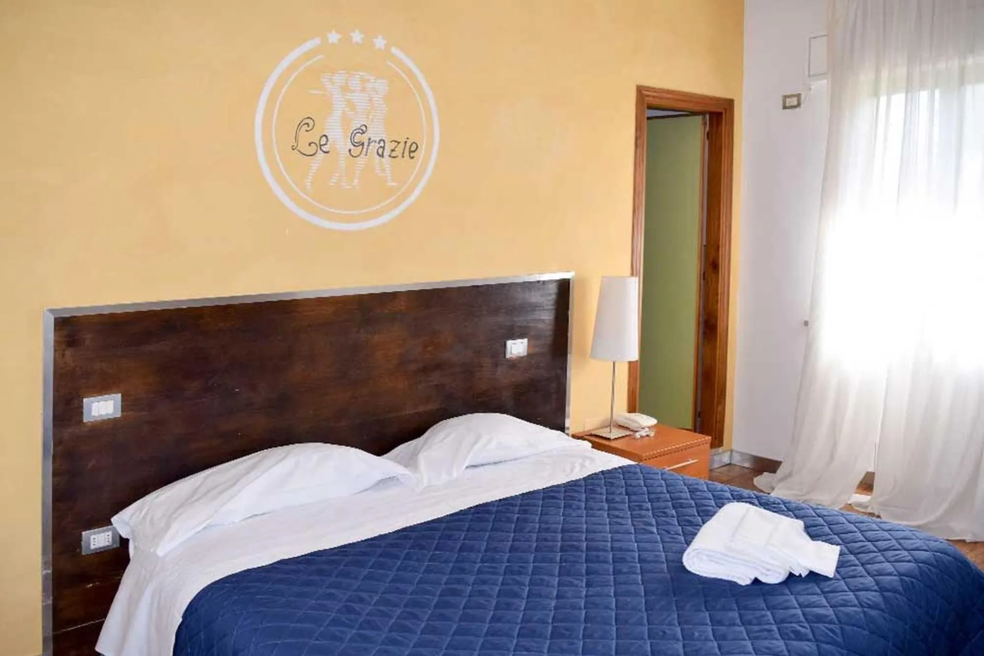 Bed in Le Grazie Hotel