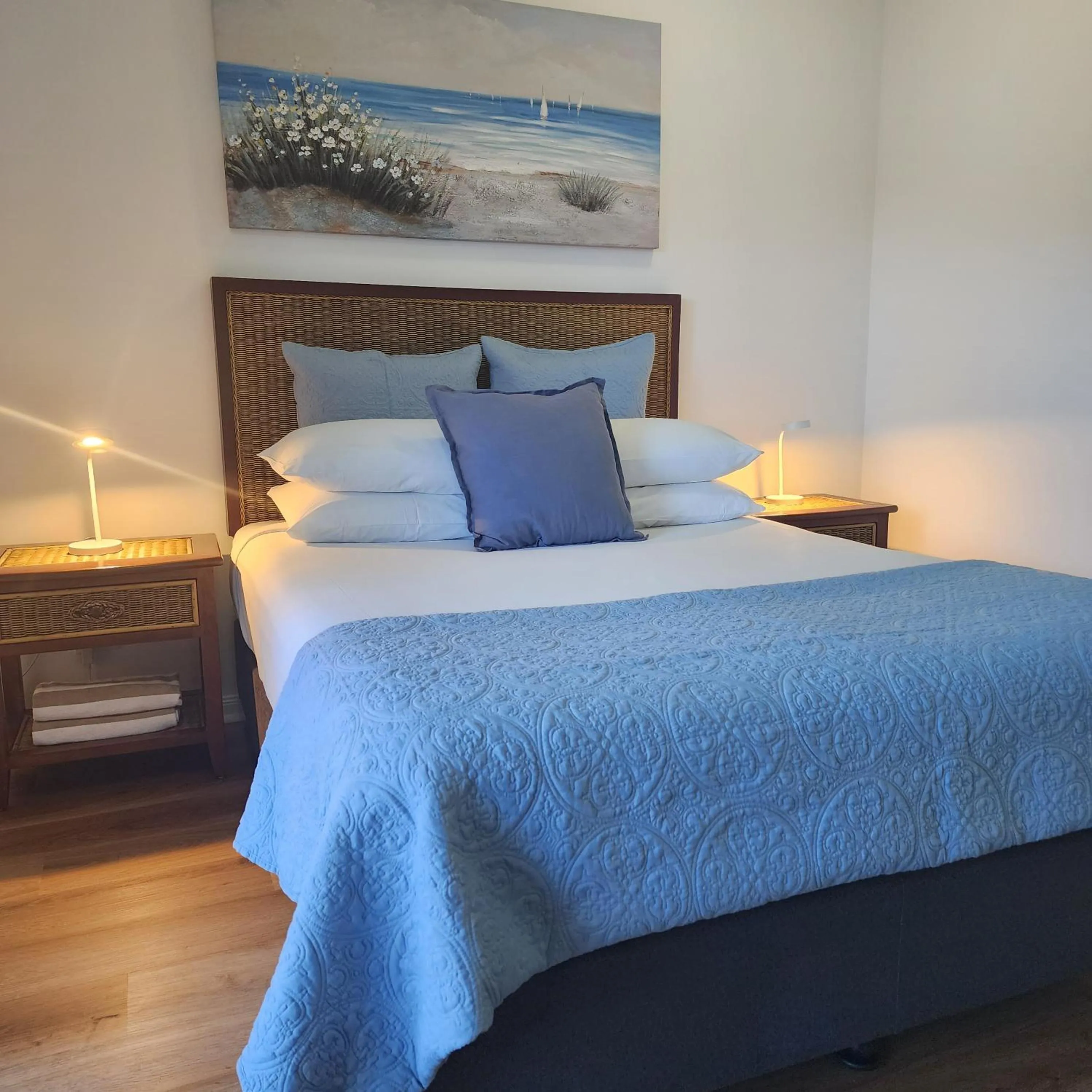 Bed in Elysium Apartments