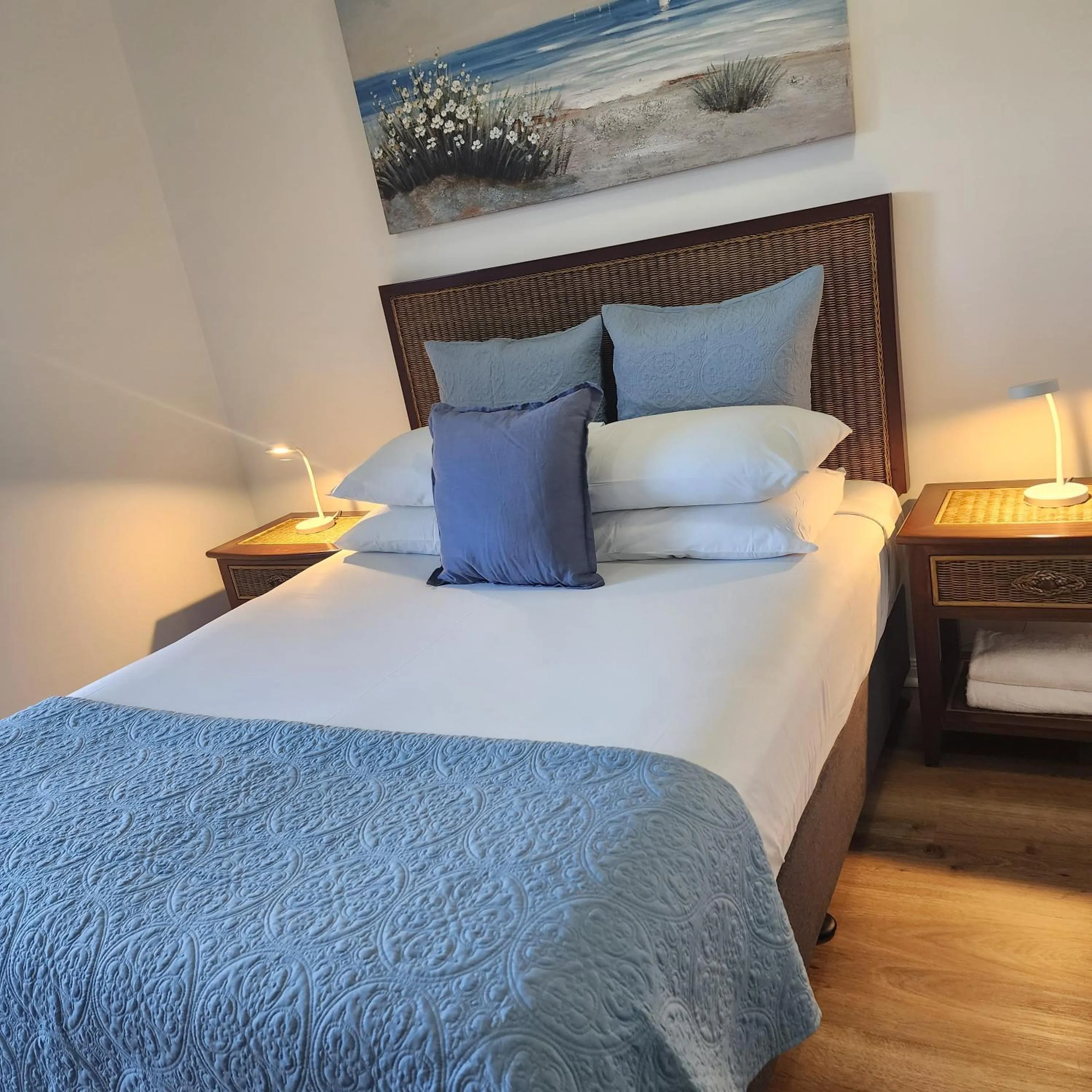 Bed in Elysium Apartments