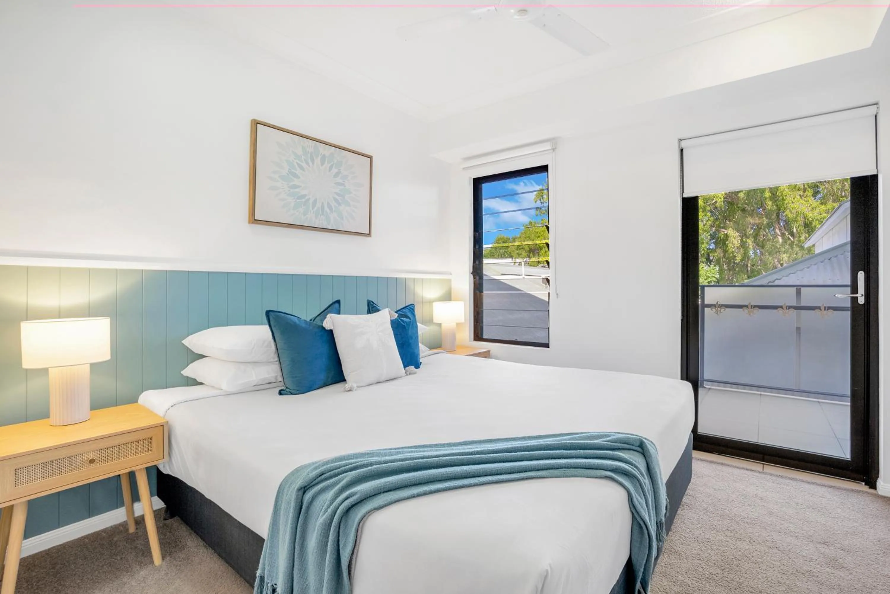 Bed in Elysium Apartments