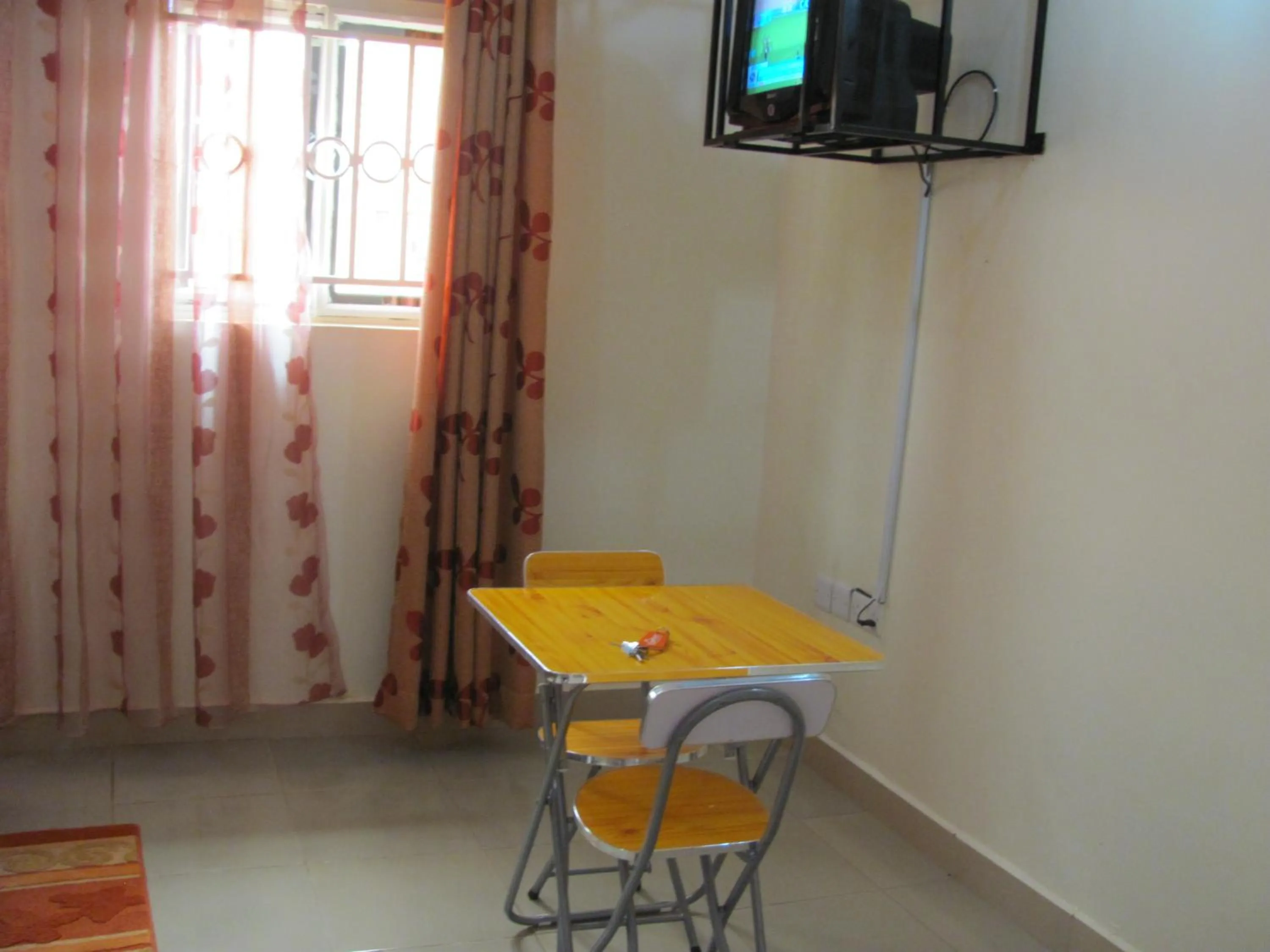 TV and multimedia in Sadrina Comfort Cottages Kyanja Kampala