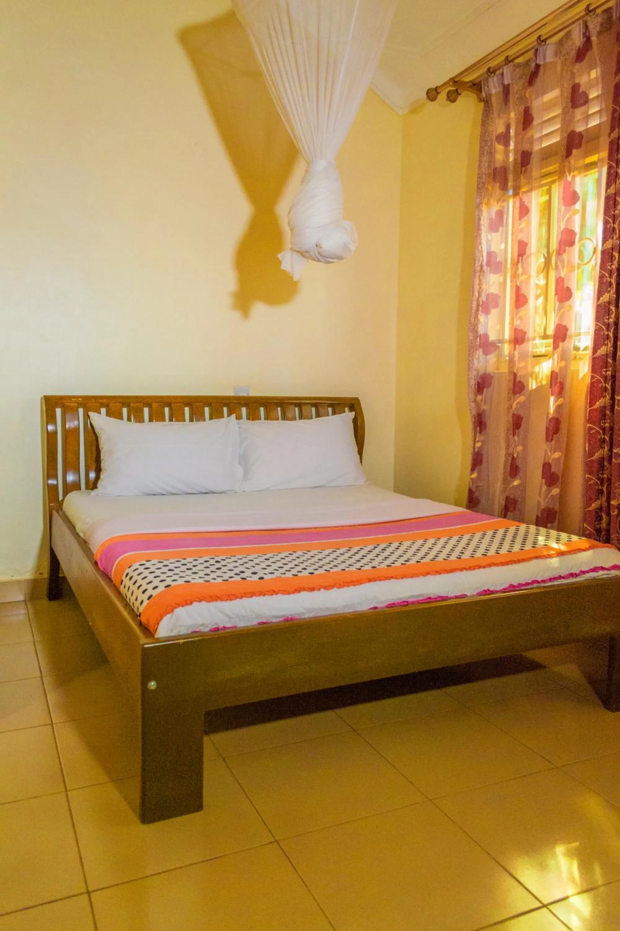 Bed in Sadrina Comfort Cottages Kyanja Kampala