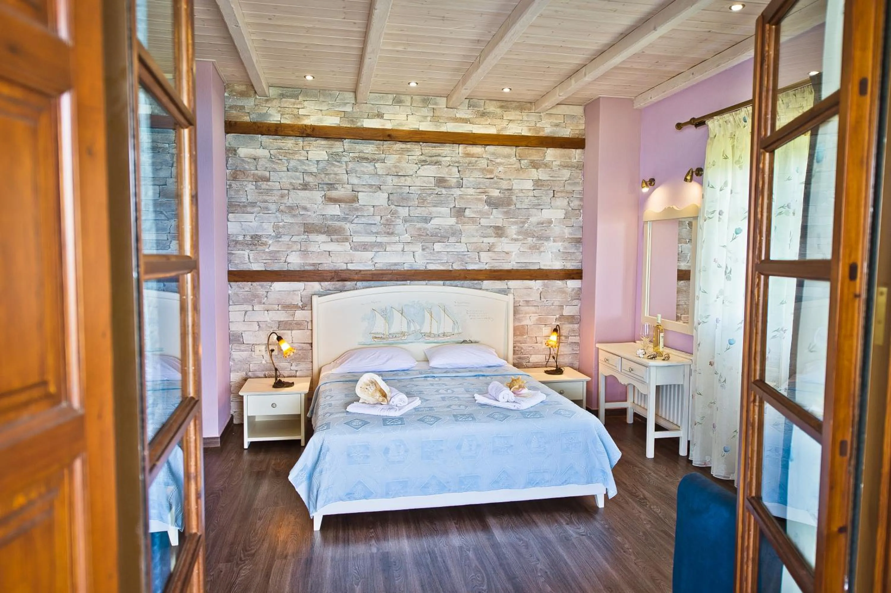 Photo of the whole room, Bed in Flamingo Hotel Pelion - Seaside Superior Studios & Suites