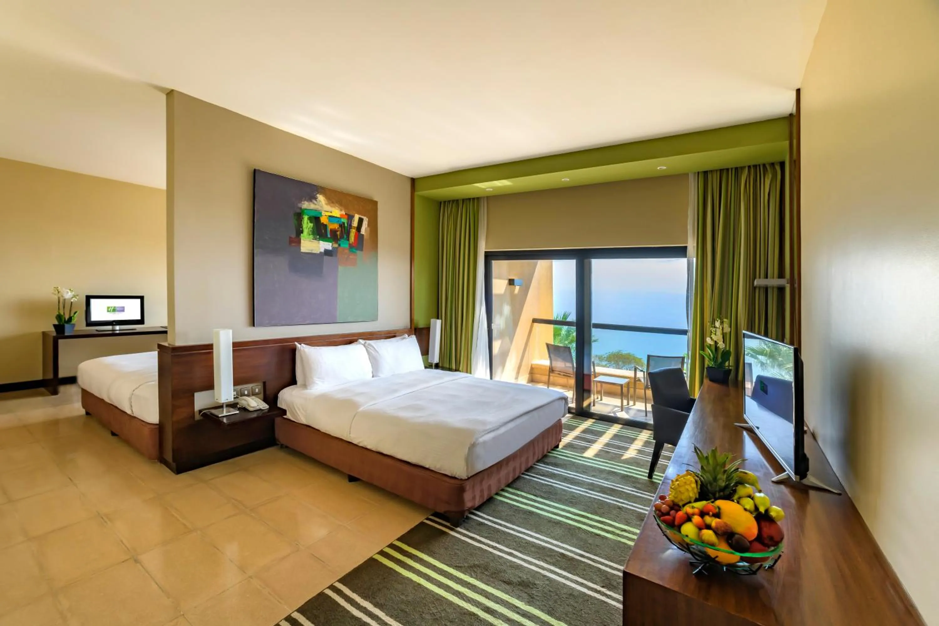 Photo of the whole room, Bed in Holiday Inn Resort Dead Sea by IHG