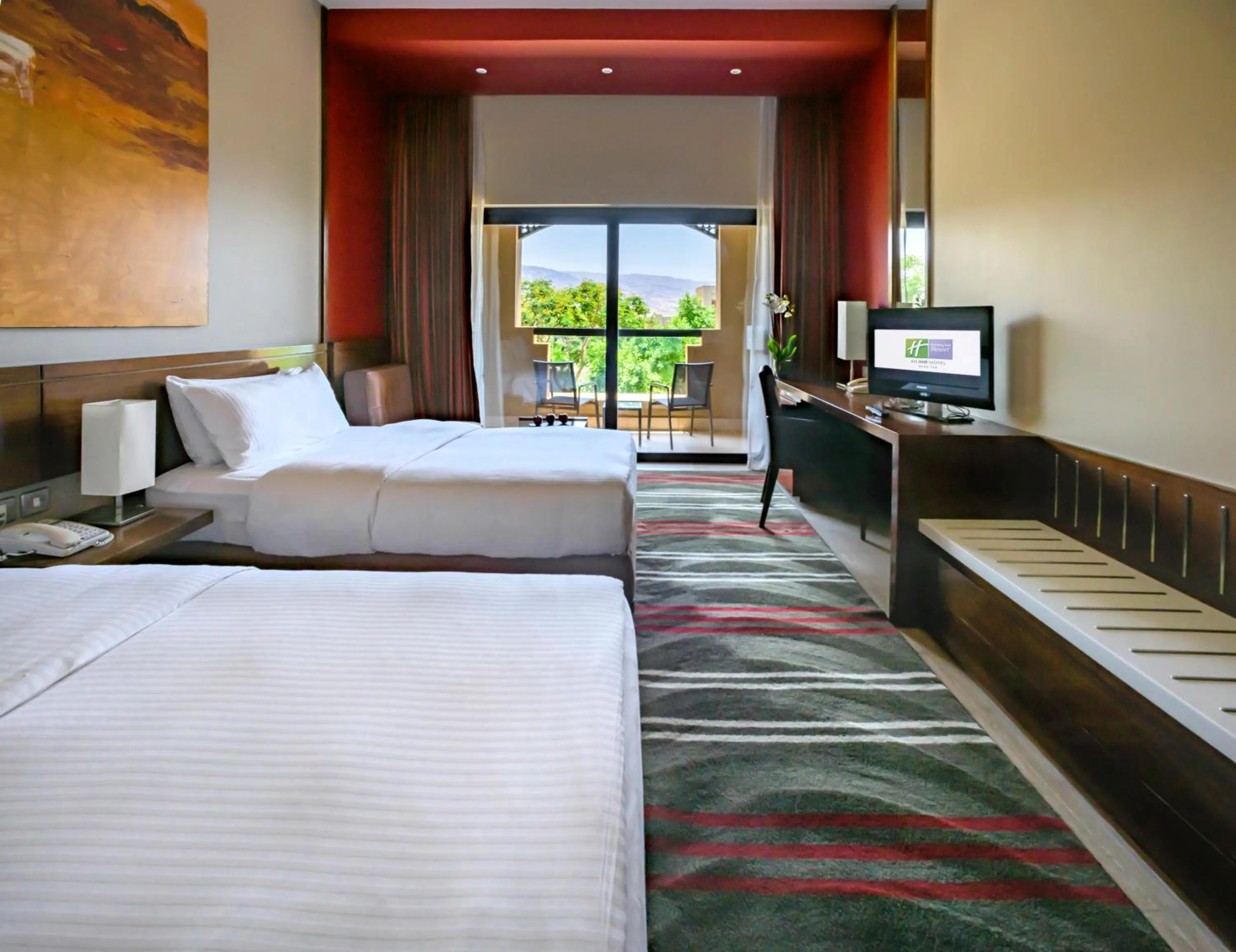 Photo of the whole room, Bed in Holiday Inn Resort Dead Sea by IHG