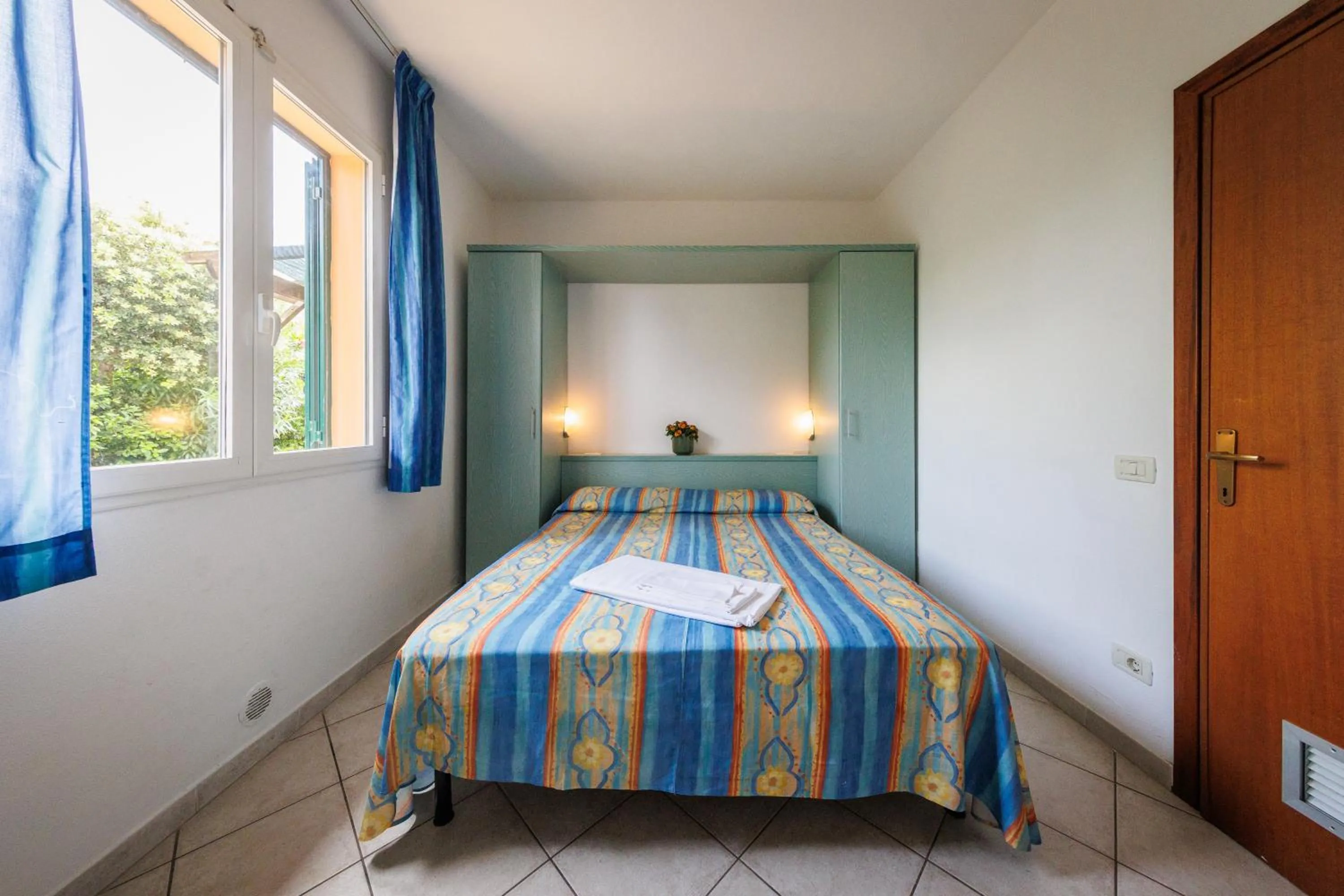 Photo of the whole room, Bed in Villaggio Turistico La Cecinella