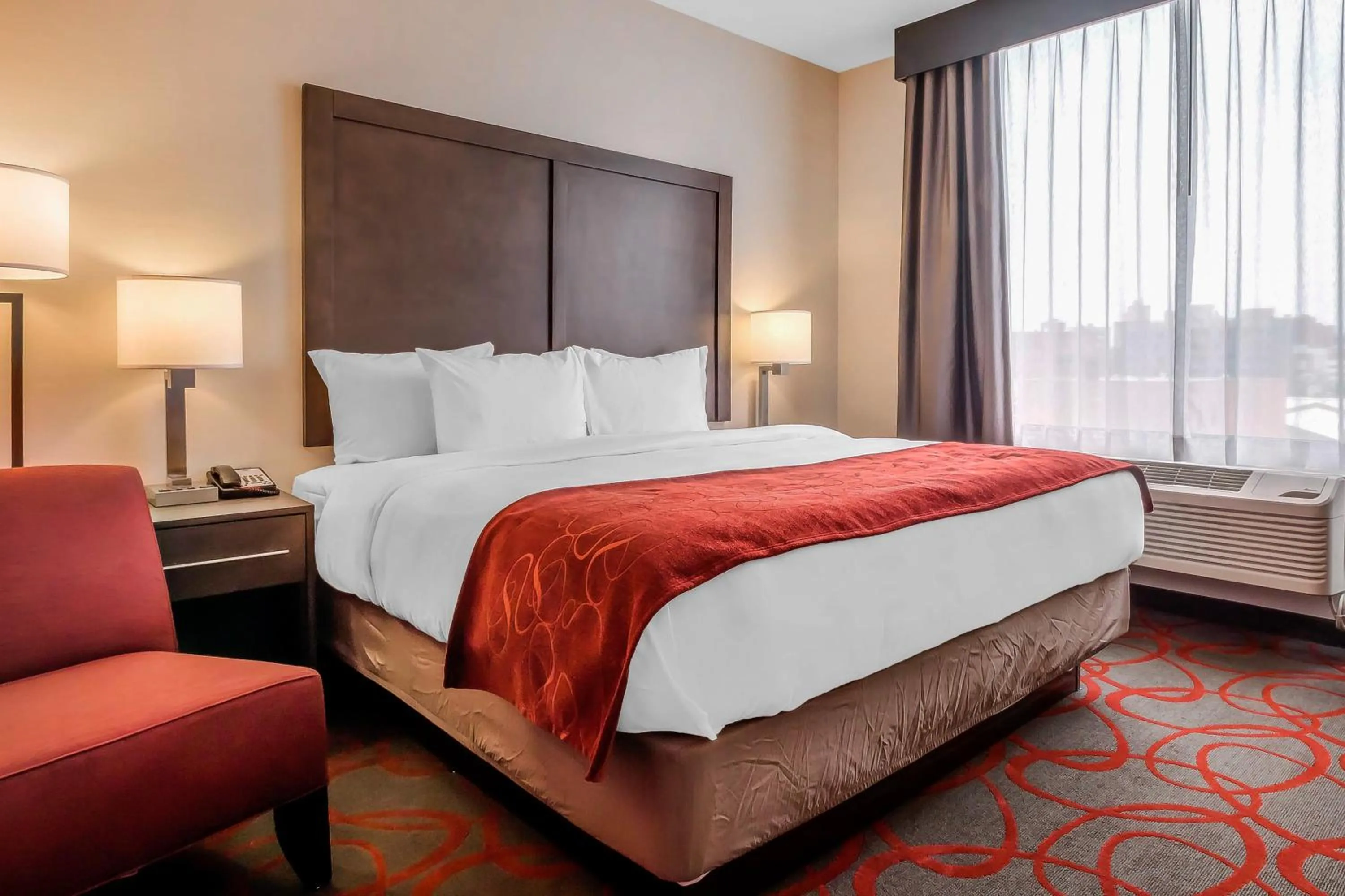 Bed in Comfort Inn & Suites near Stadium