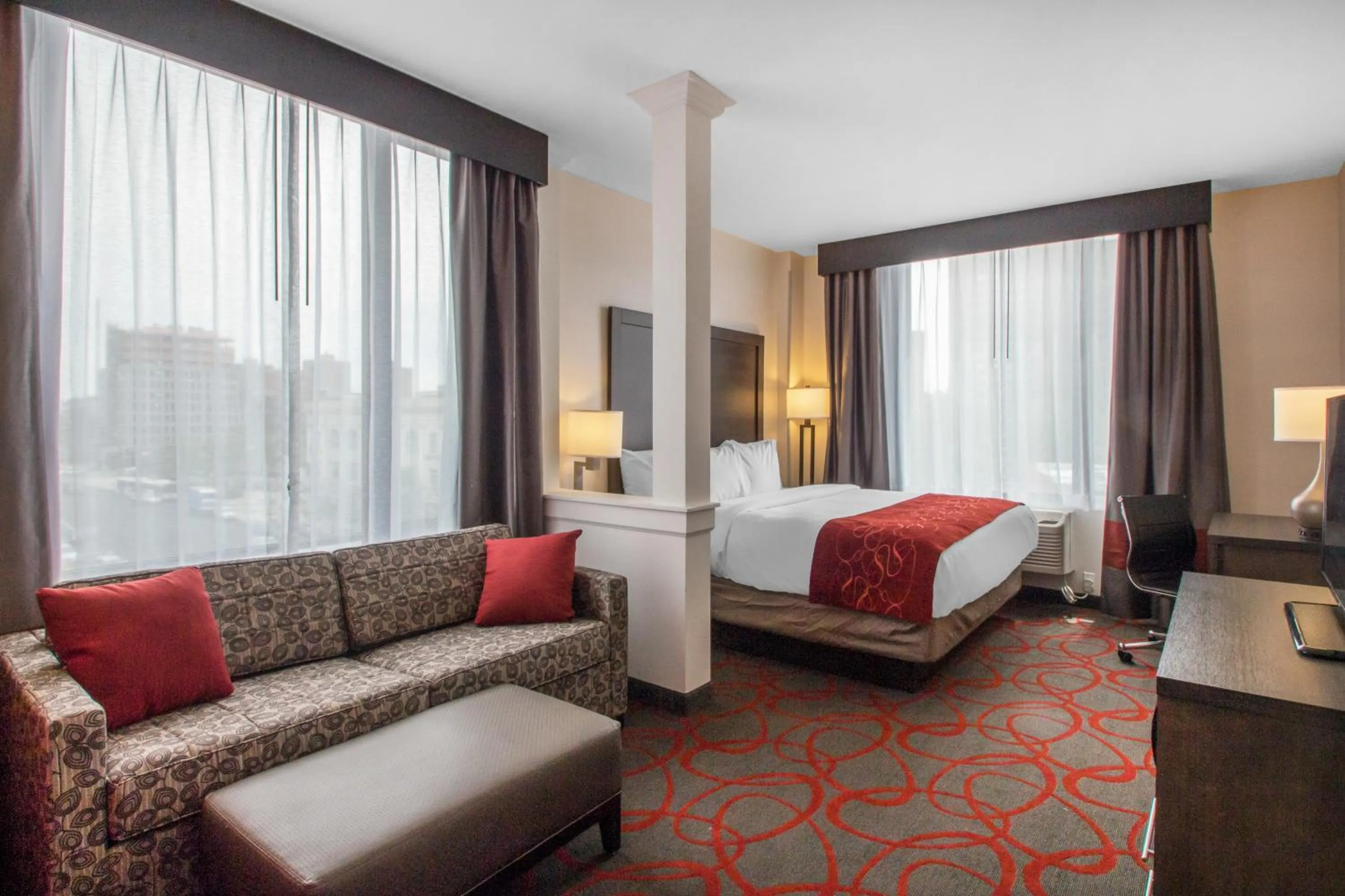 Photo of the whole room, Bed in Comfort Inn & Suites near Stadium