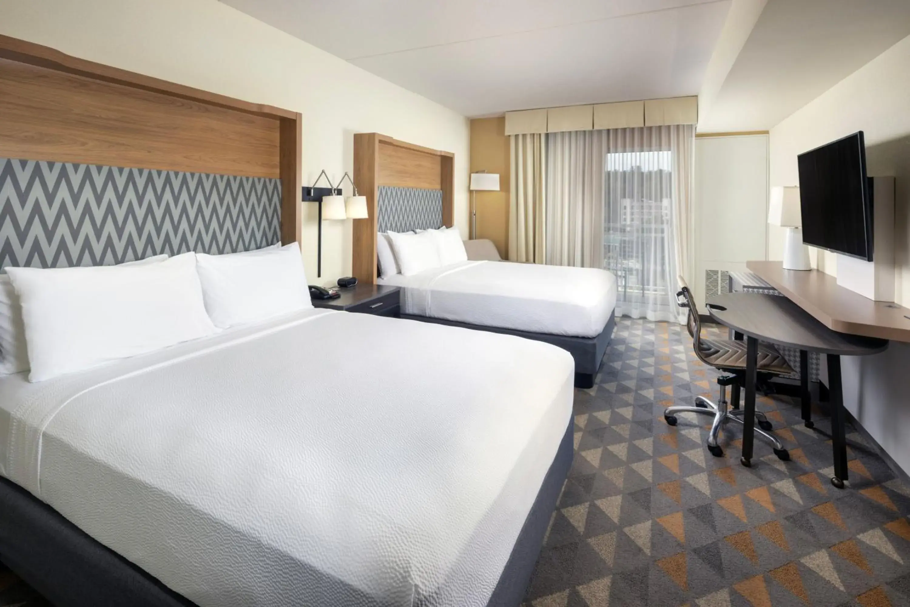 One-Bedroom Queen Suite with Sofa Bed and Balcony in Holiday Inn & Suites Asheville-Biltmore Vlg Area, an IHG Hotel One-Bedroom Queen Suite with Sofa Bed and Balcony in Holiday Inn & Suites Asheville-Biltmore Vlg Area, an IHG Hotel