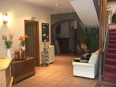 Lobby or reception in Logis L'Ecu De France