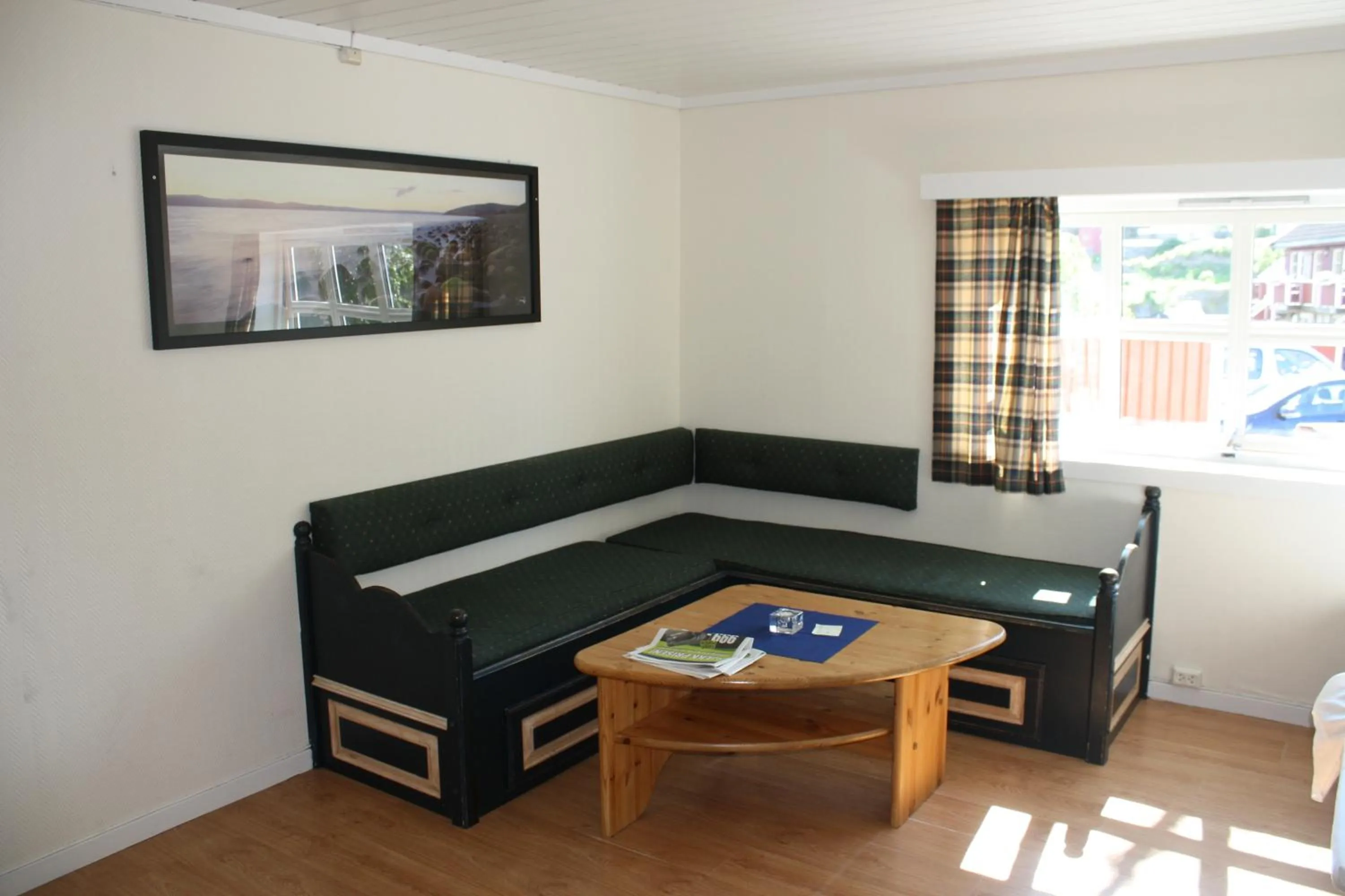 Seating area, Bed in Kragerø Sportell & Apartments