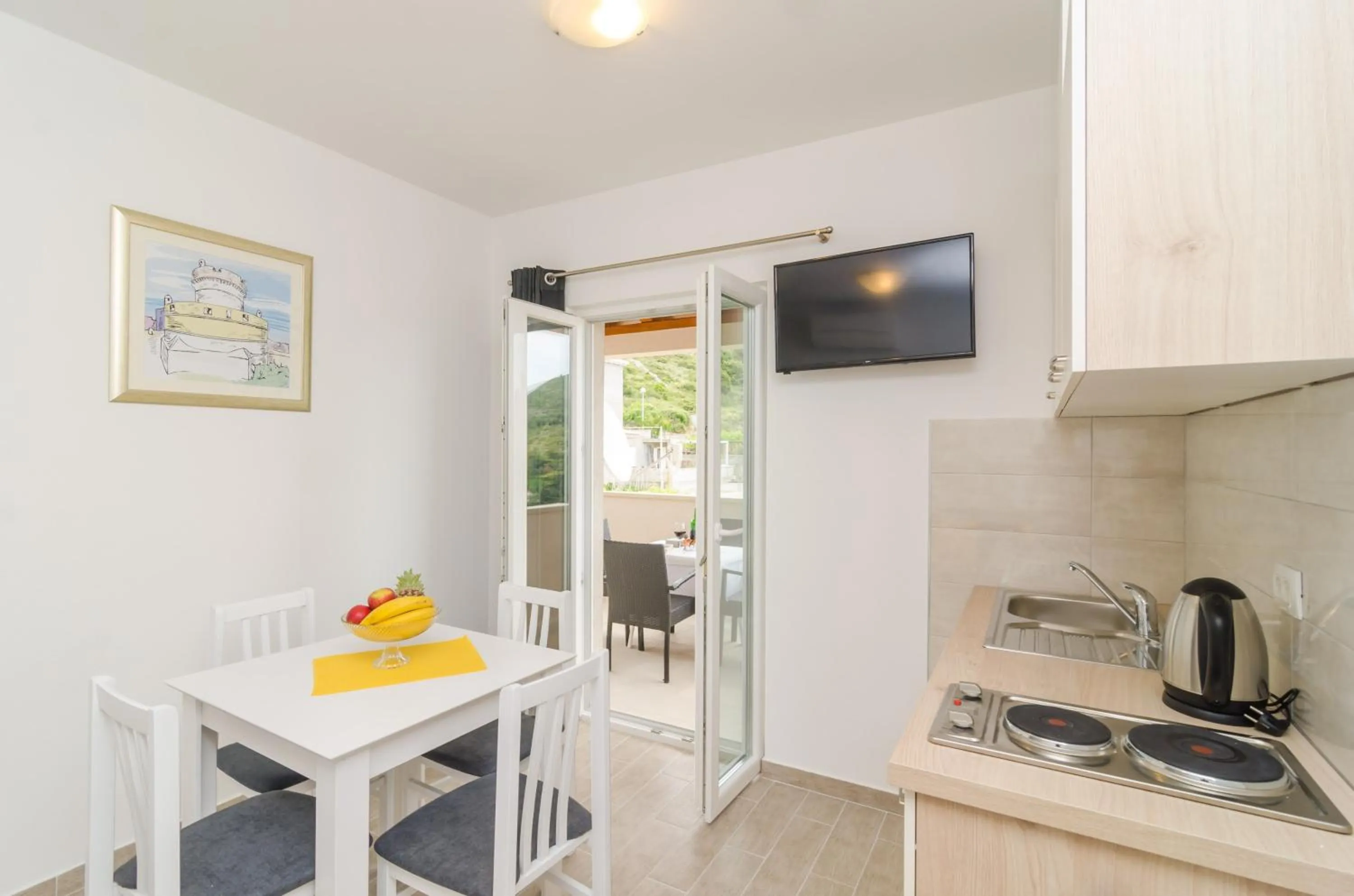 Kitchen or kitchenette in Apartments Villa Dadić