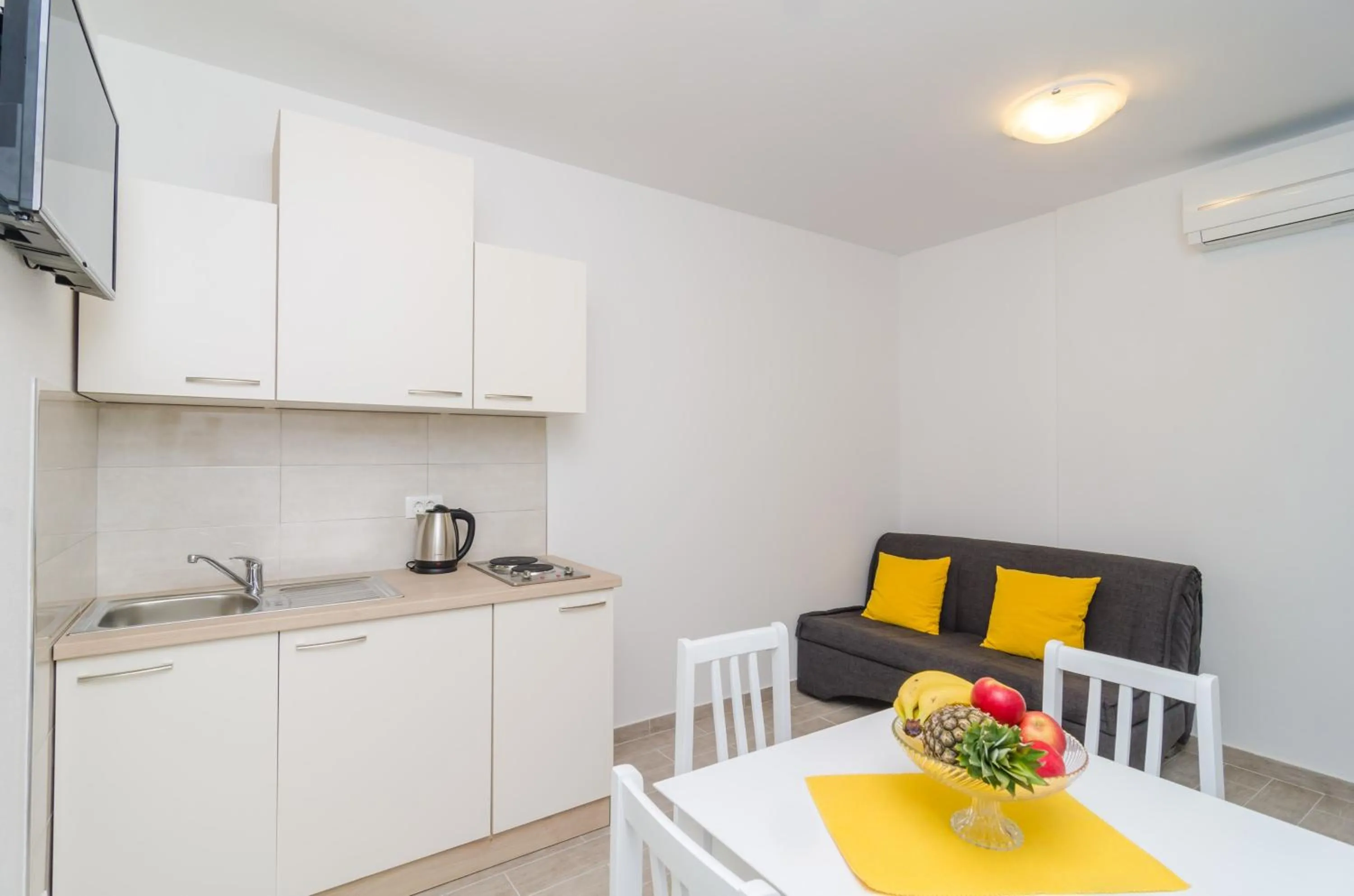 Kitchen or kitchenette in Apartments Villa Dadić