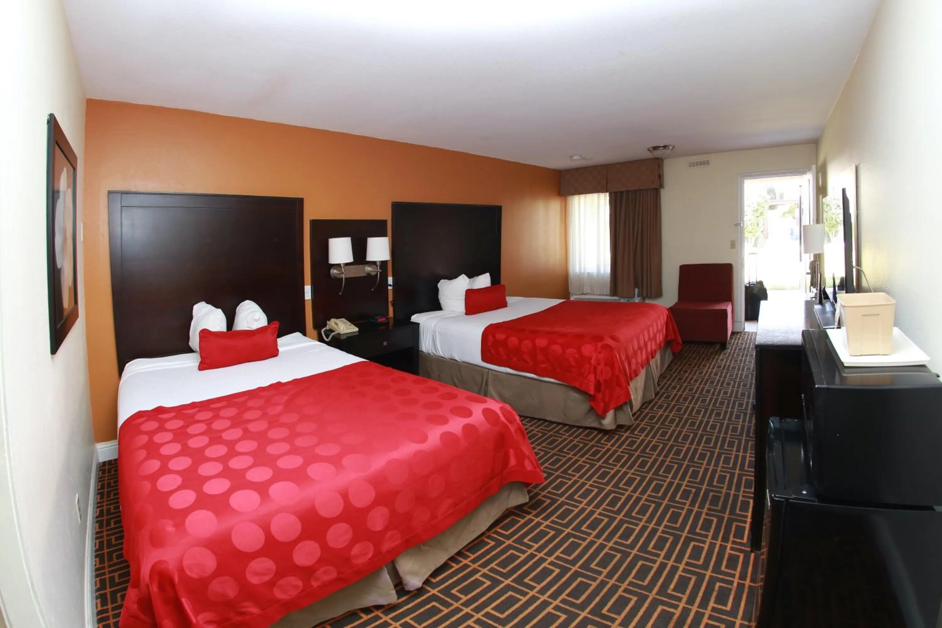 Bed in Ramada by Wyndham Fresno North