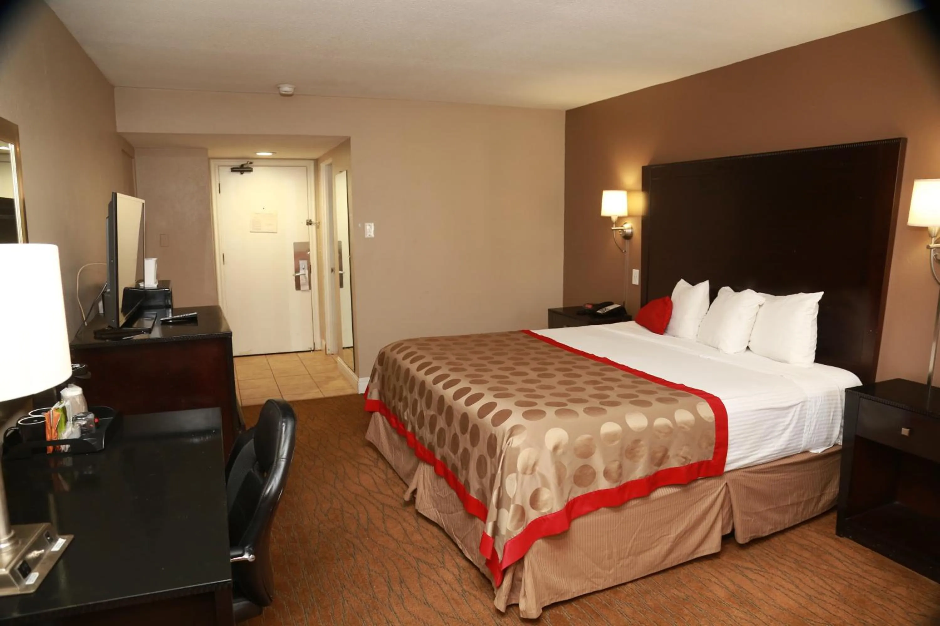 Bed in Ramada by Wyndham Fresno North
