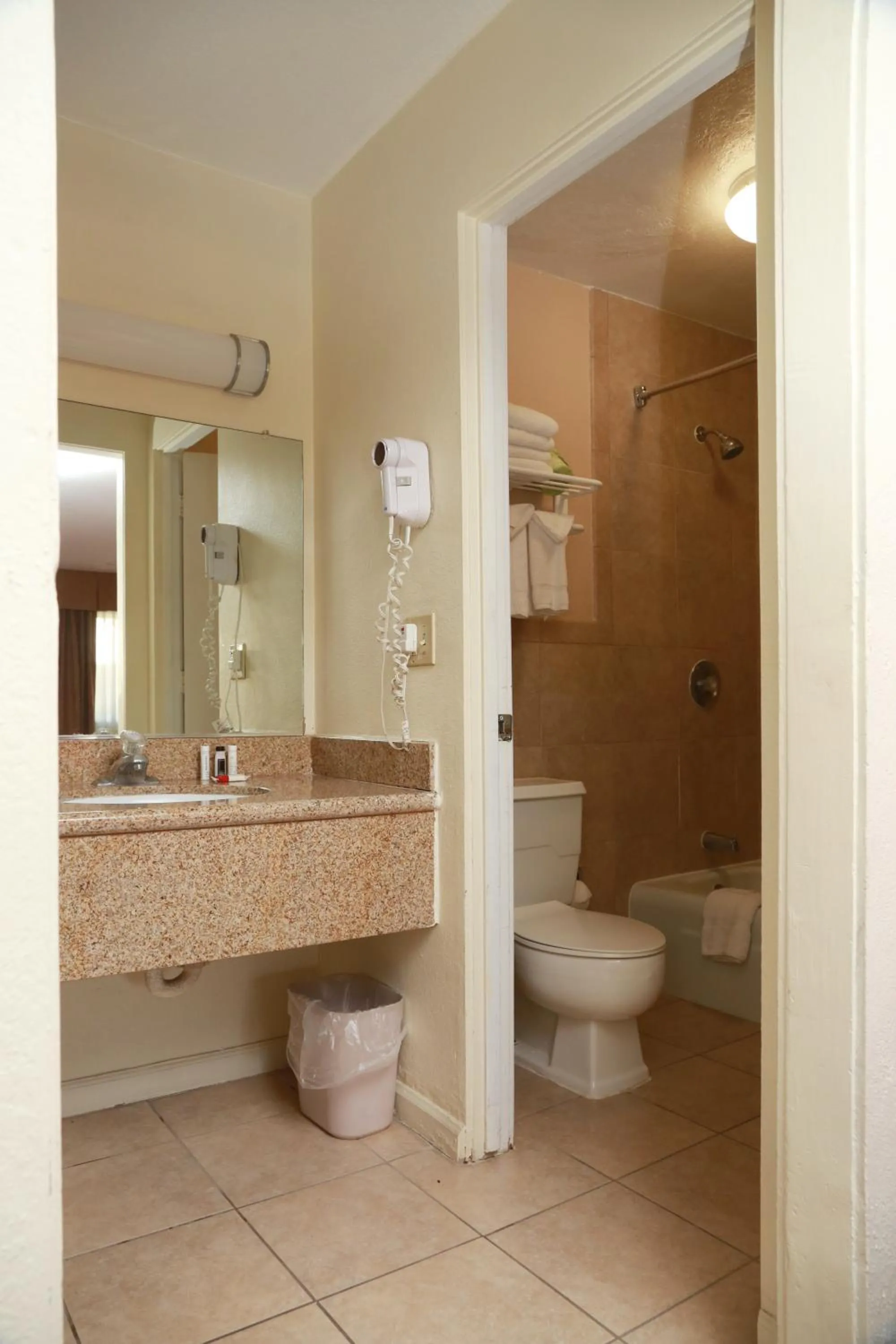 Bathroom in Ramada by Wyndham Fresno North