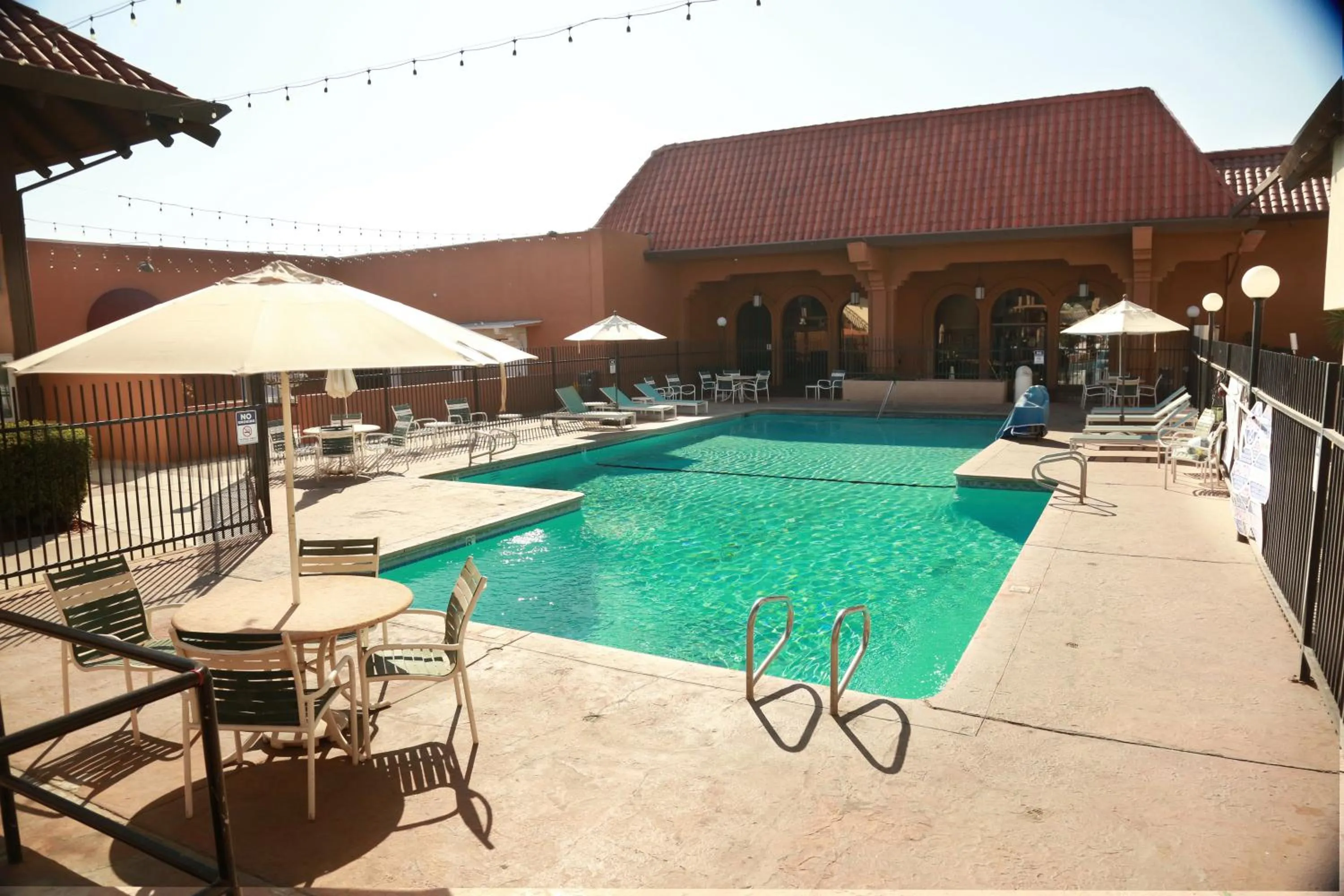 Pool view in Ramada by Wyndham Fresno North