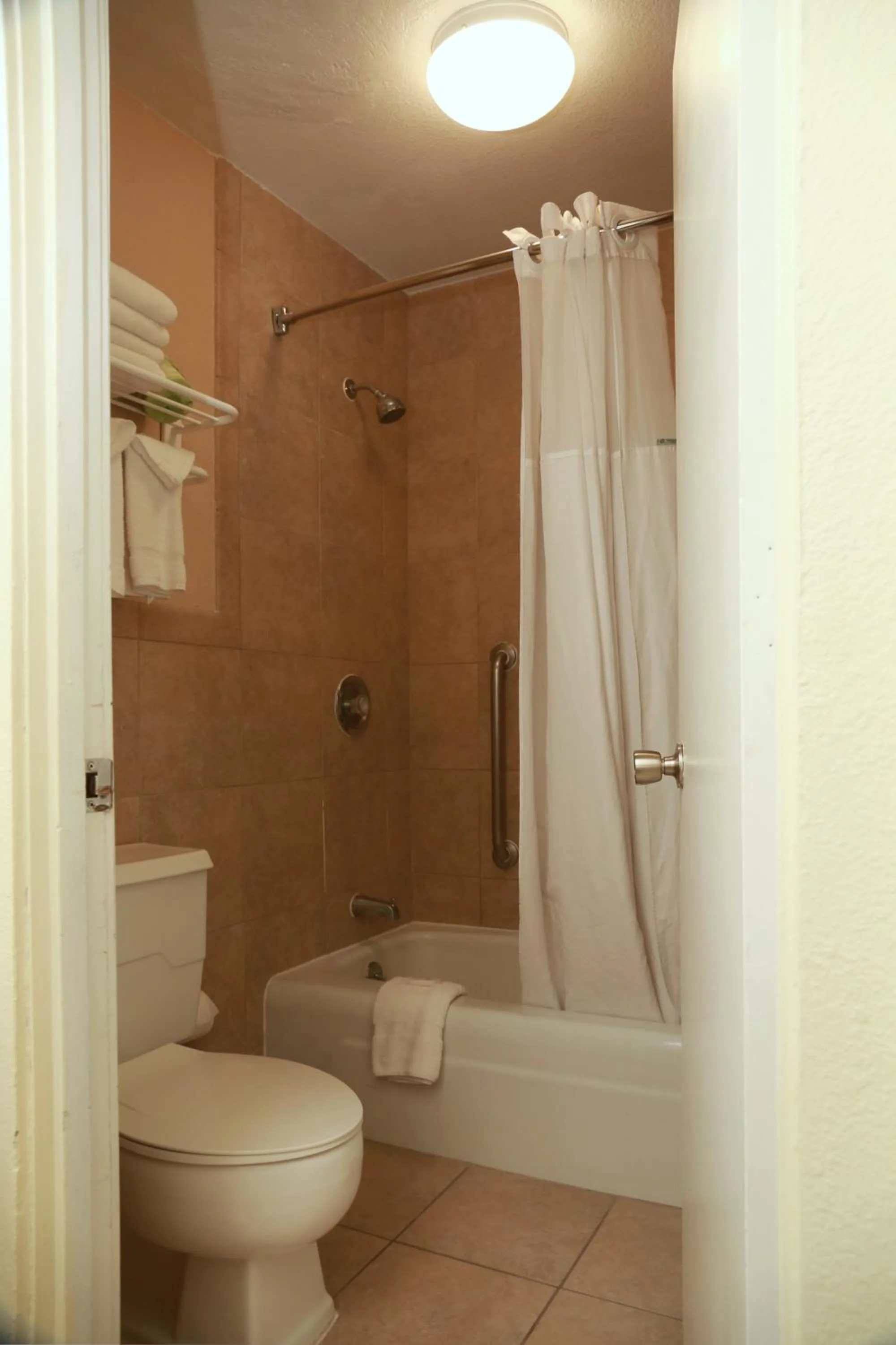Bathroom in Ramada by Wyndham Fresno North