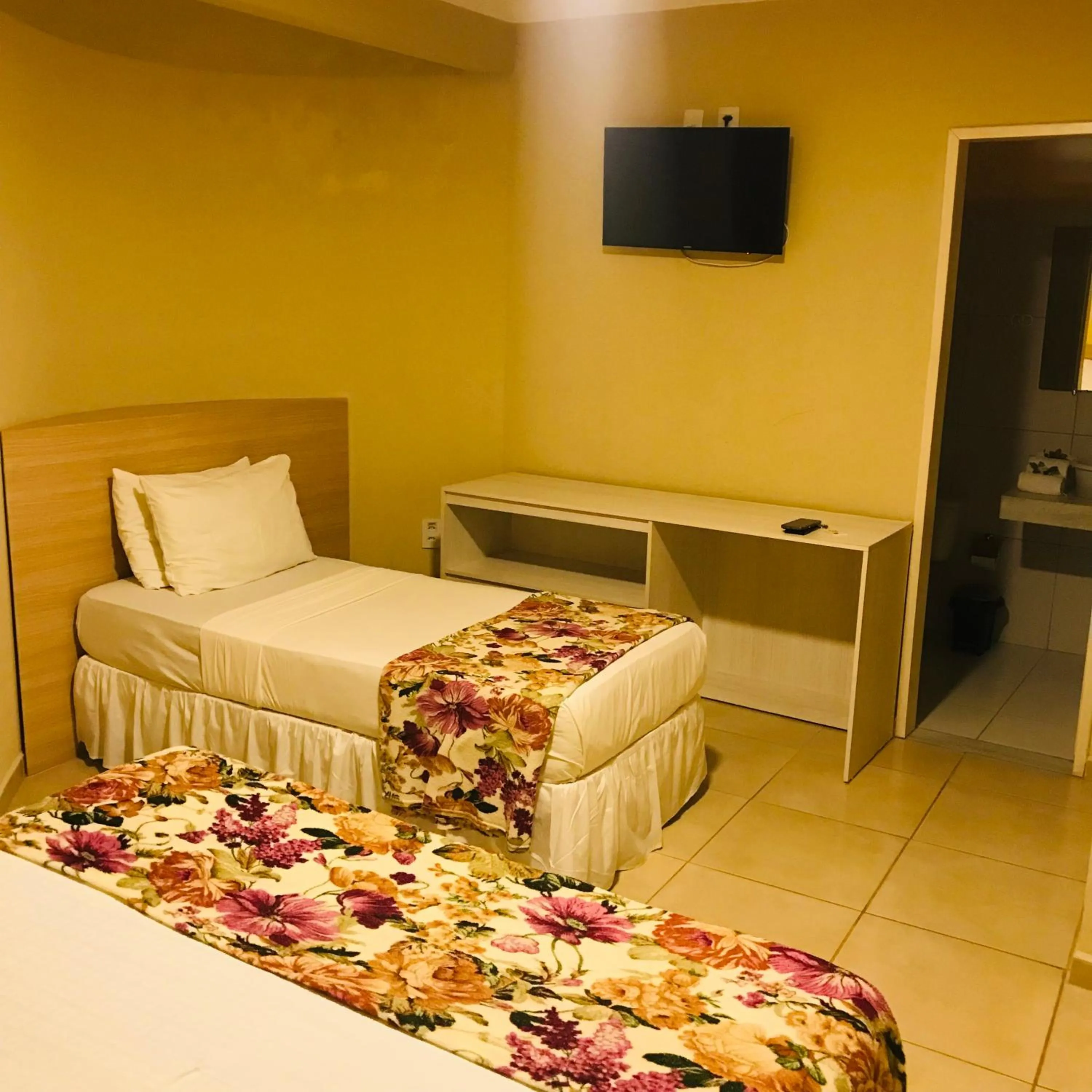 TV and multimedia, Bed in Hotel Pousada Latitude