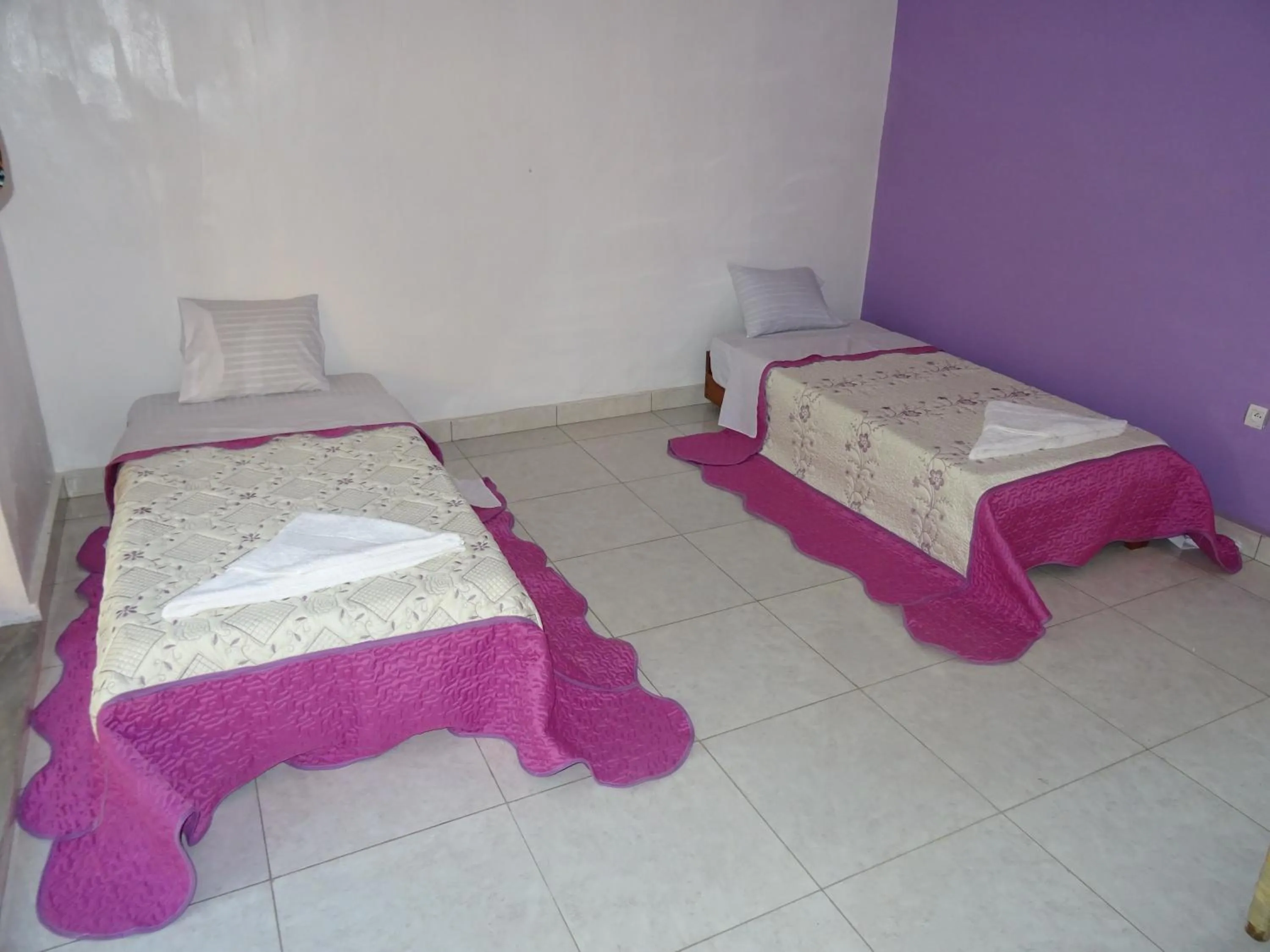 Bed in Kivu Beach Garden