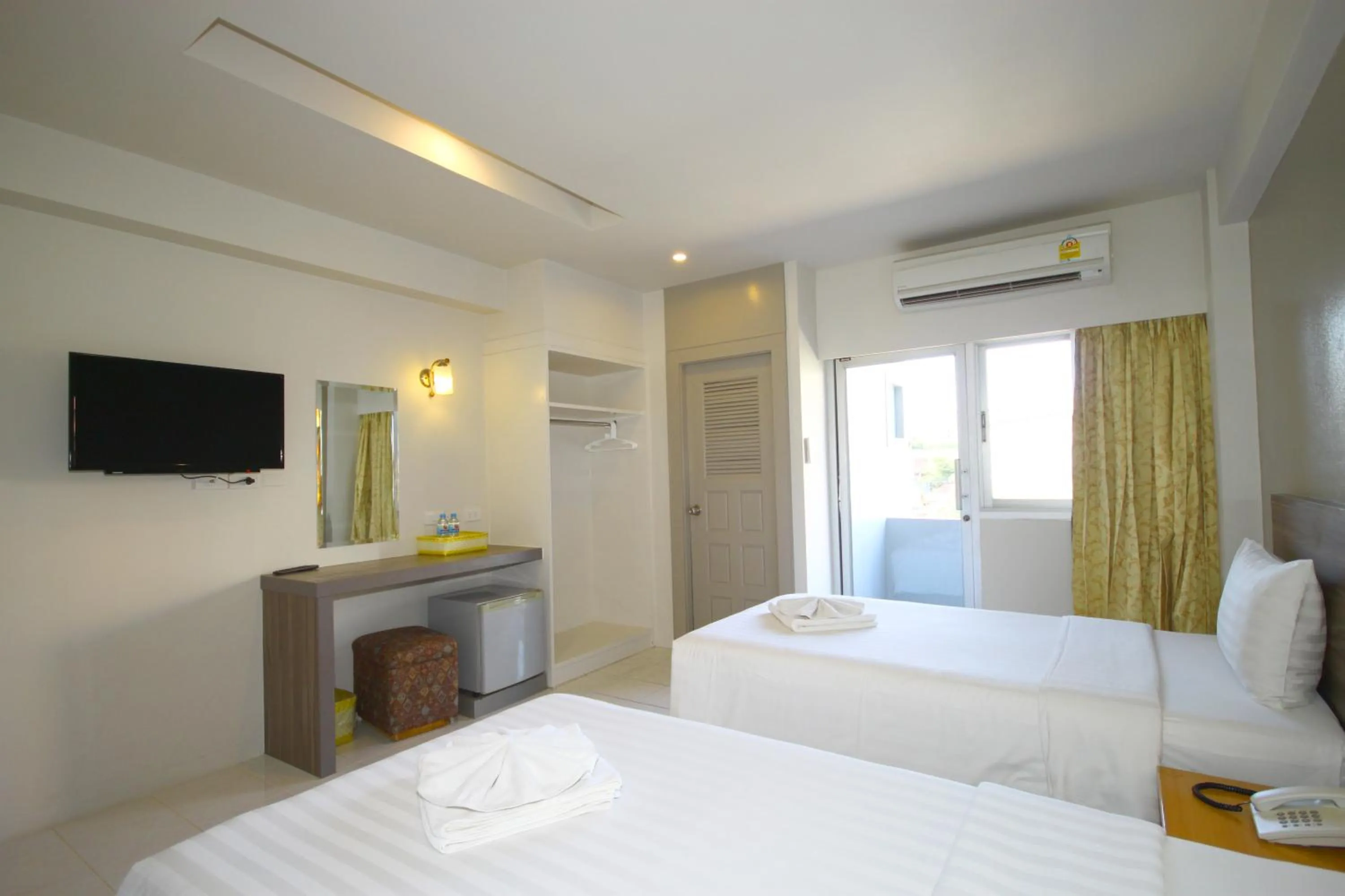 Bed in Eastiny Inn Hotel