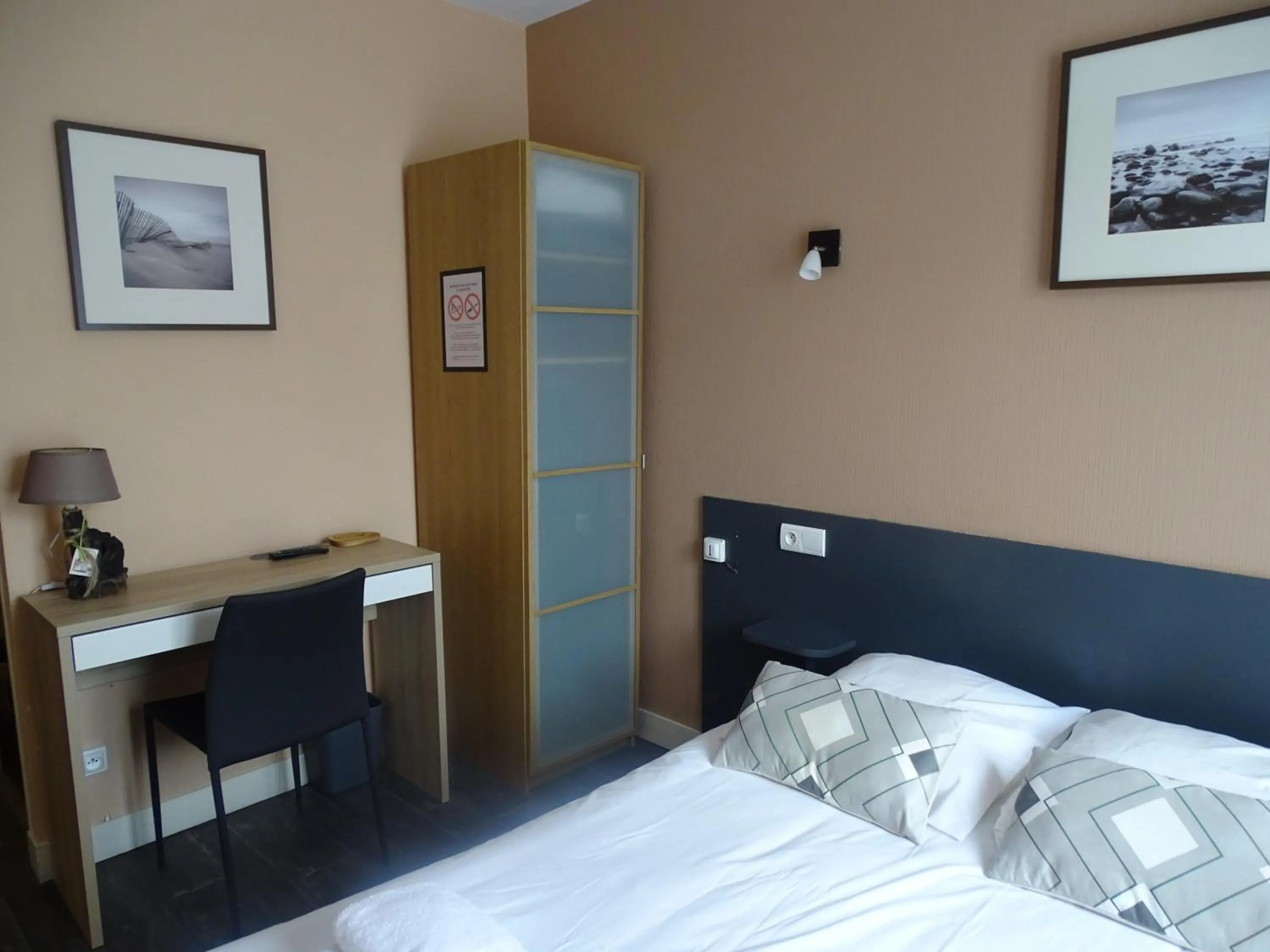 Photo of the whole room, Bed in Logis Hôtel AMBROISE