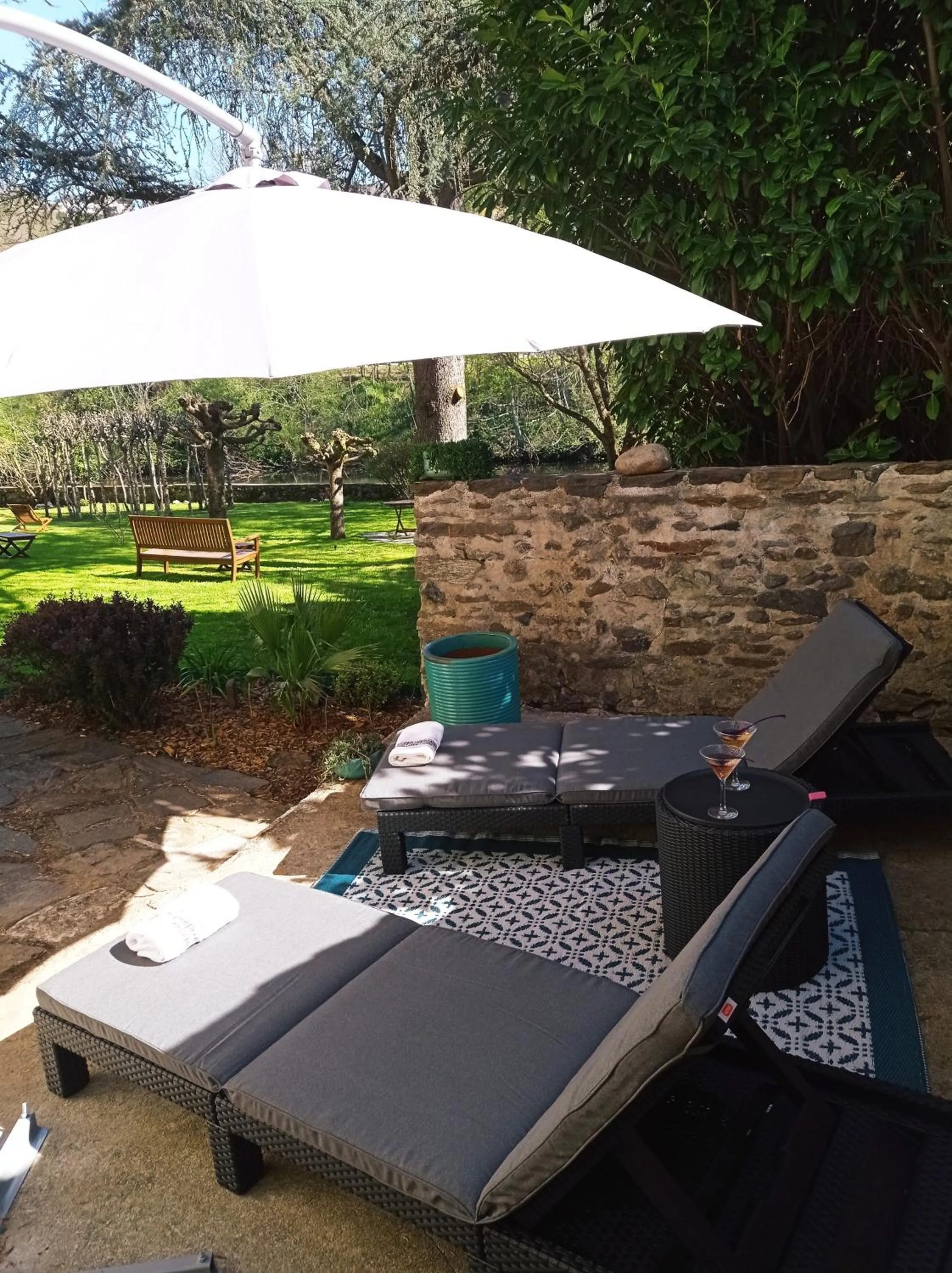 Garden view in Logis Hôtel AMBROISE