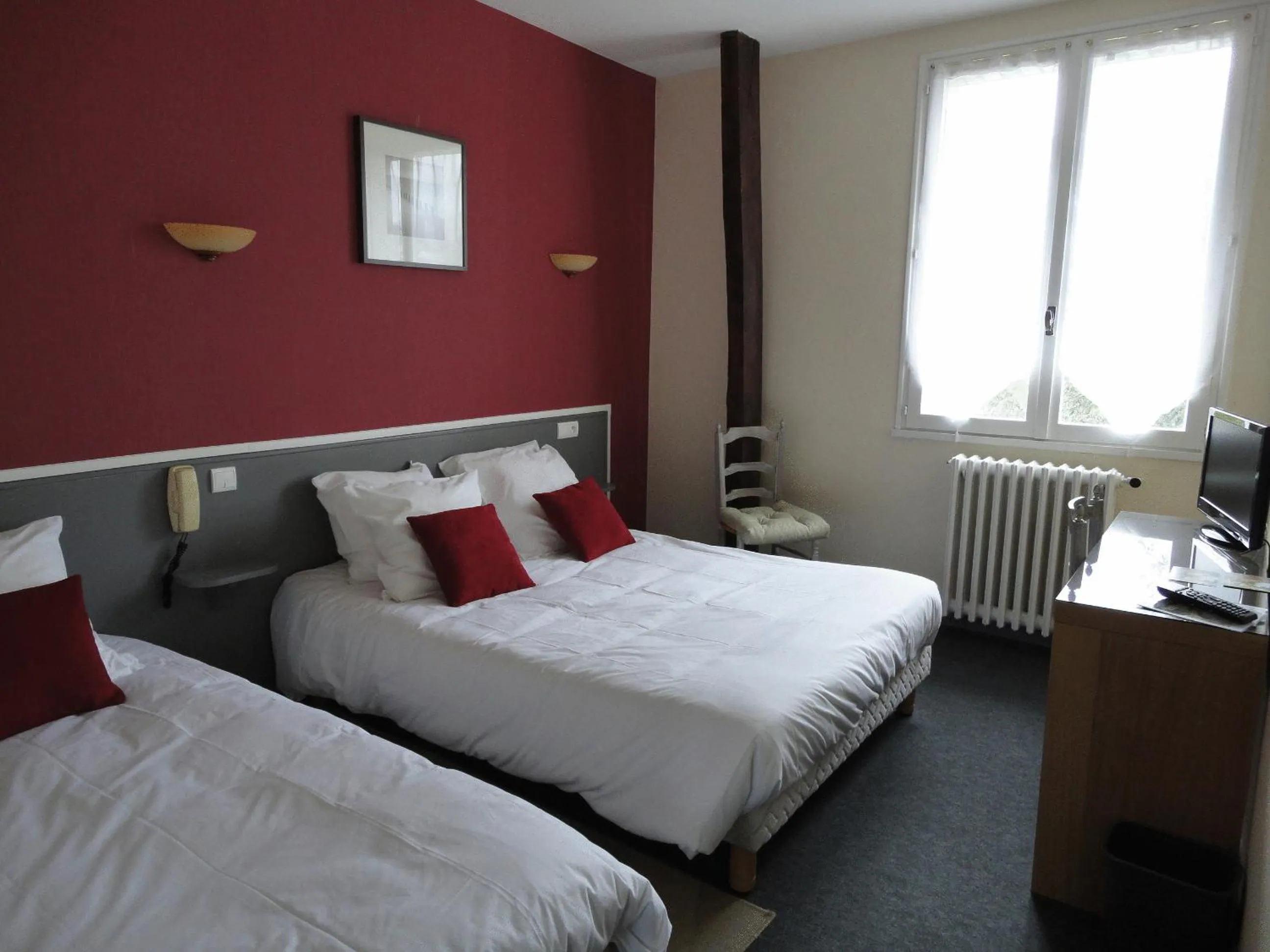 Photo of the whole room, Bed in Logis Hôtel AMBROISE