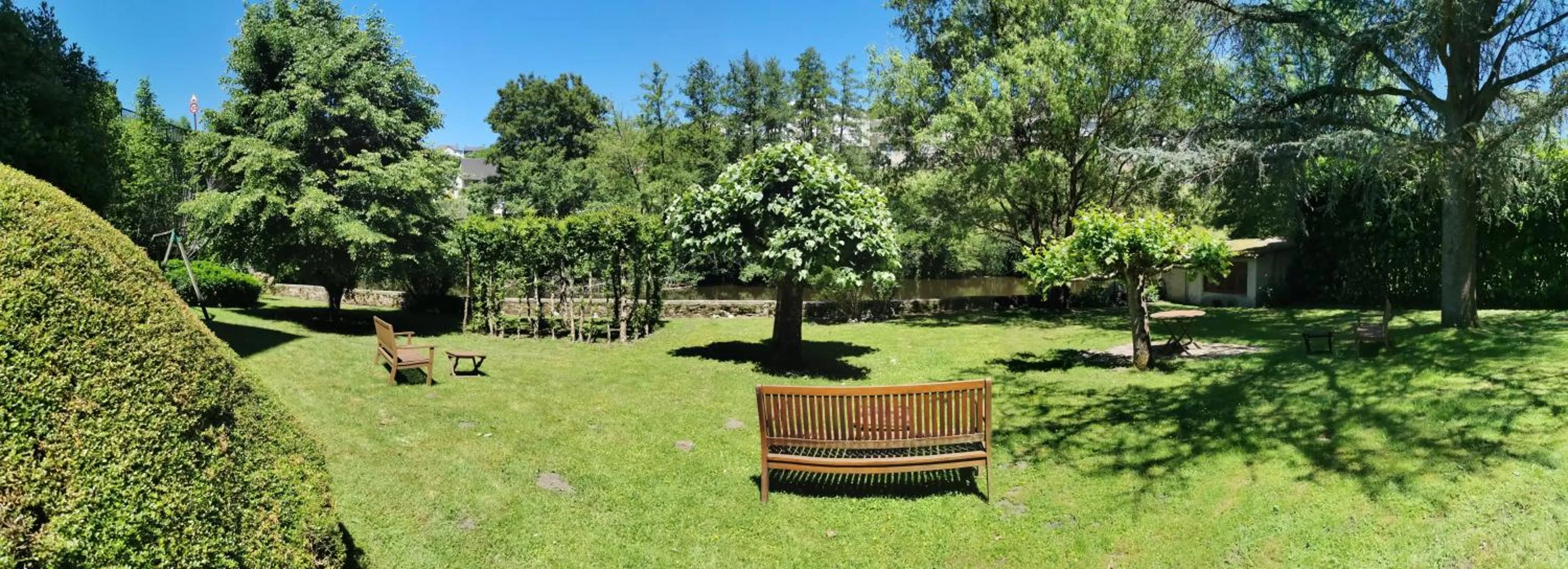 Garden in Logis Hôtel AMBROISE