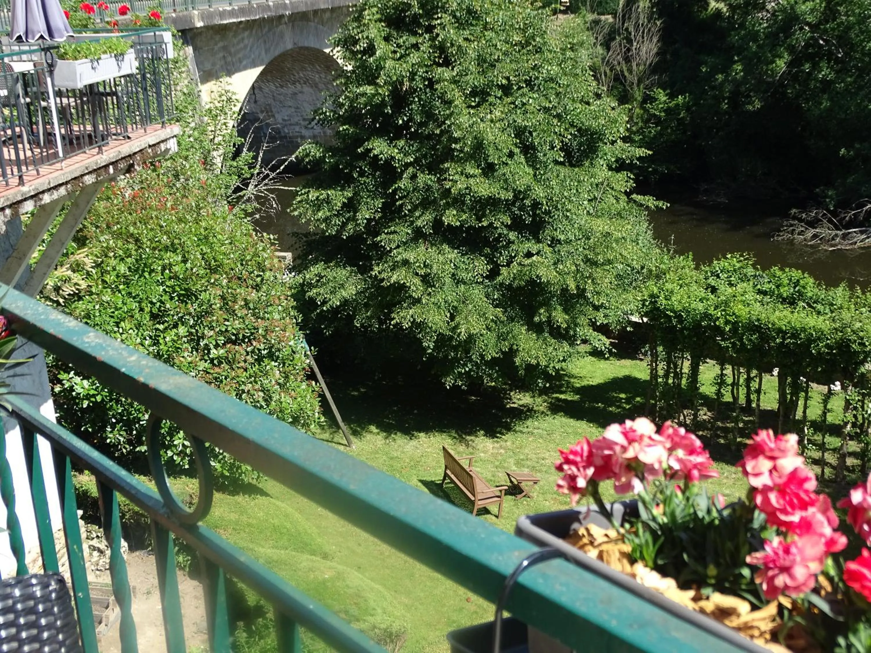 Garden in Logis Hôtel AMBROISE