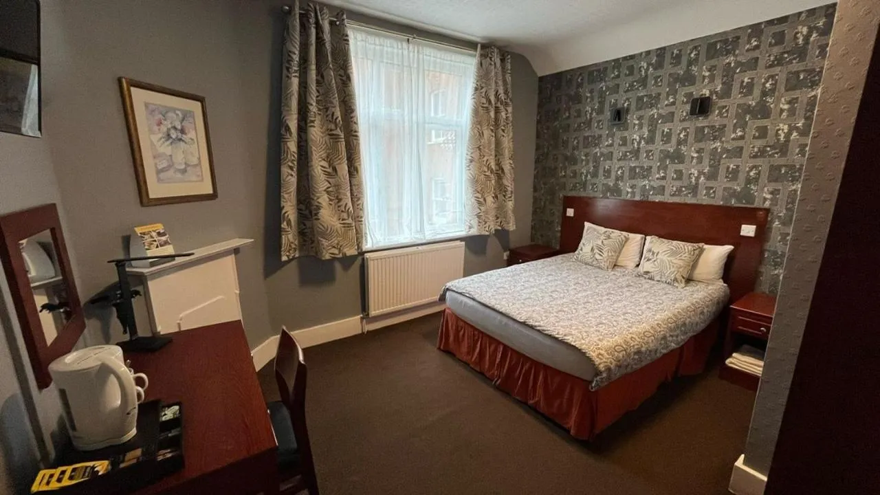 Bedroom, Bed in Charlotte Guest House