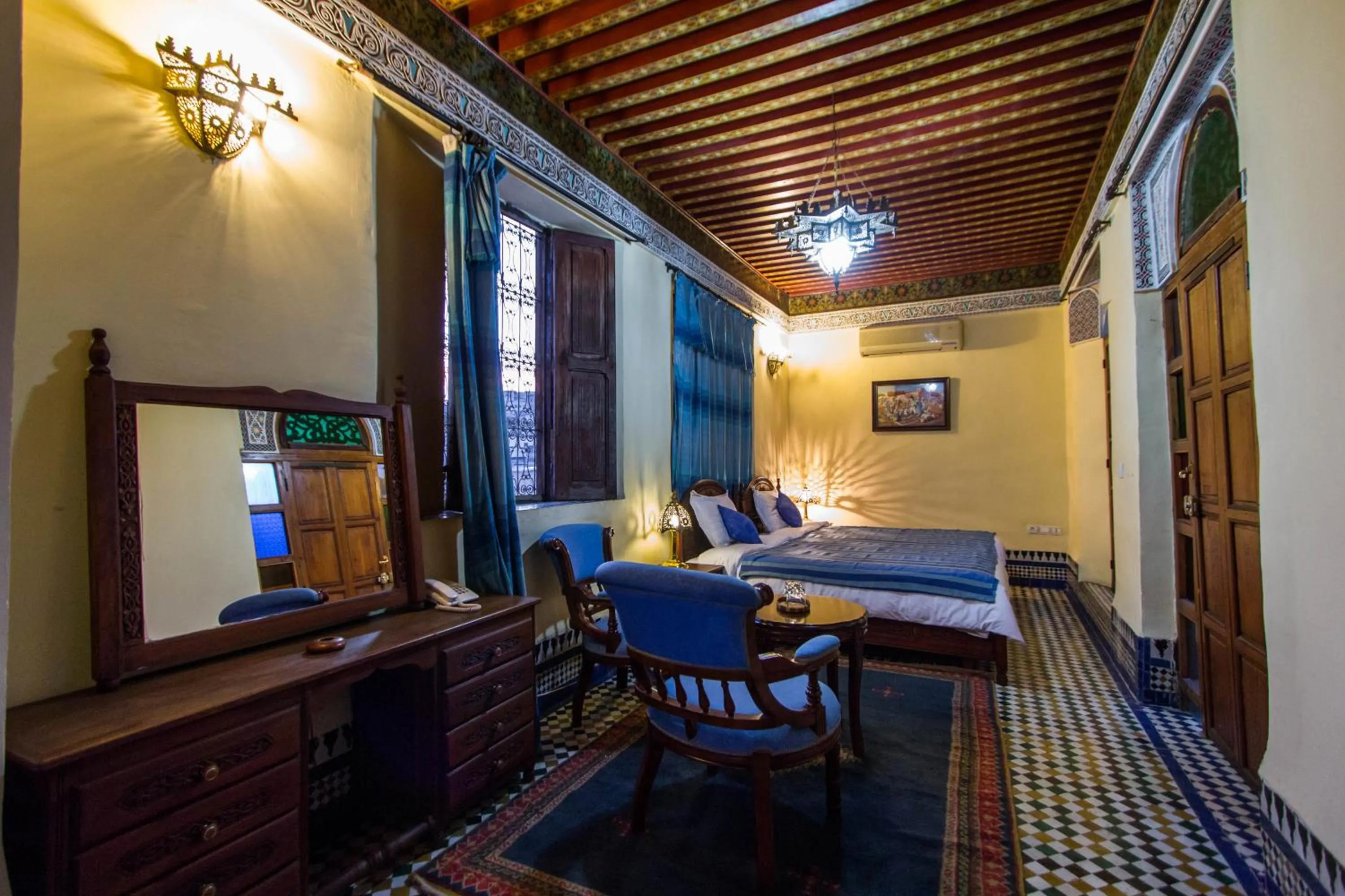 Seating area, Bed in Riad Ibn Khaldoun