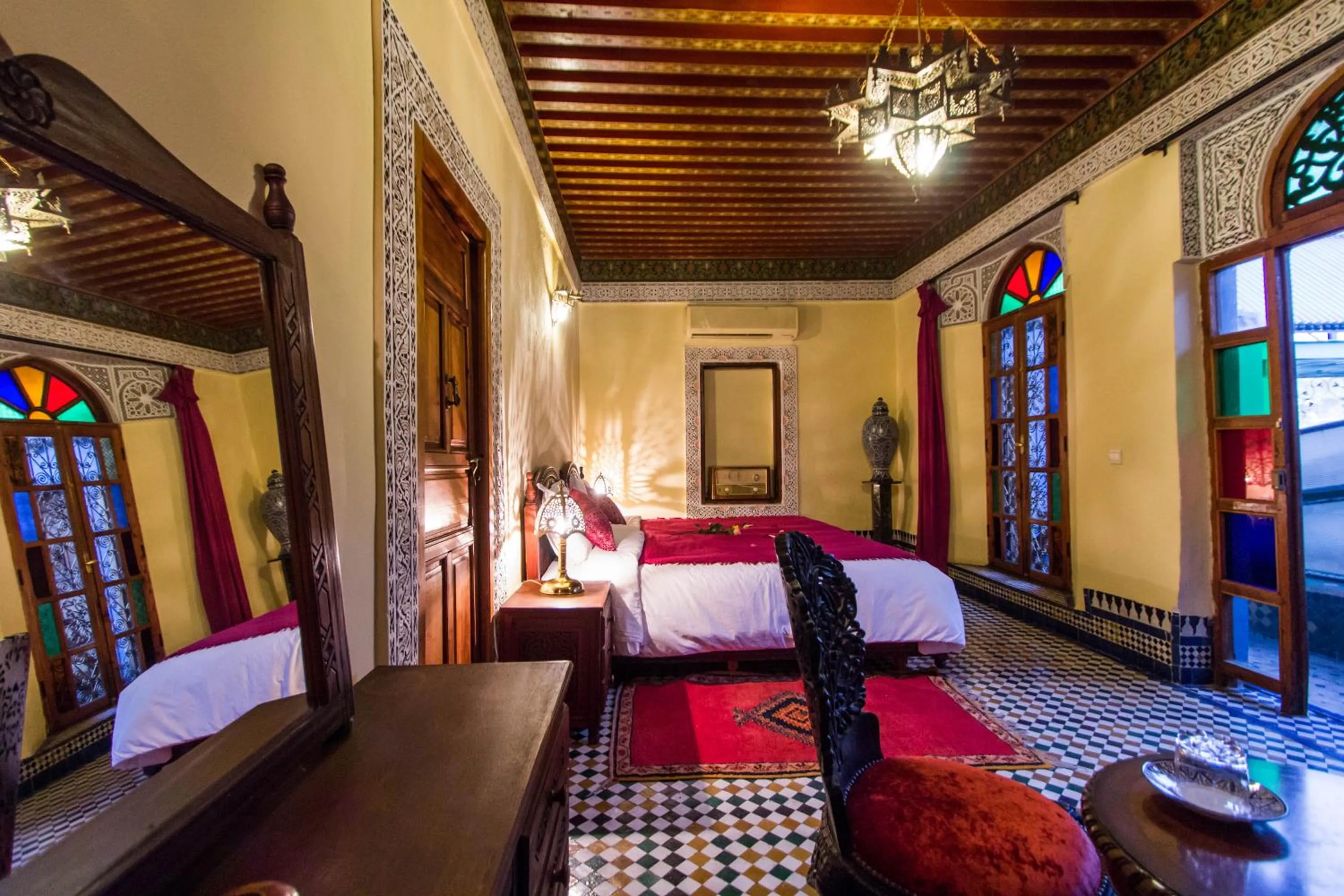 Seating area, Bed in Riad Ibn Khaldoun