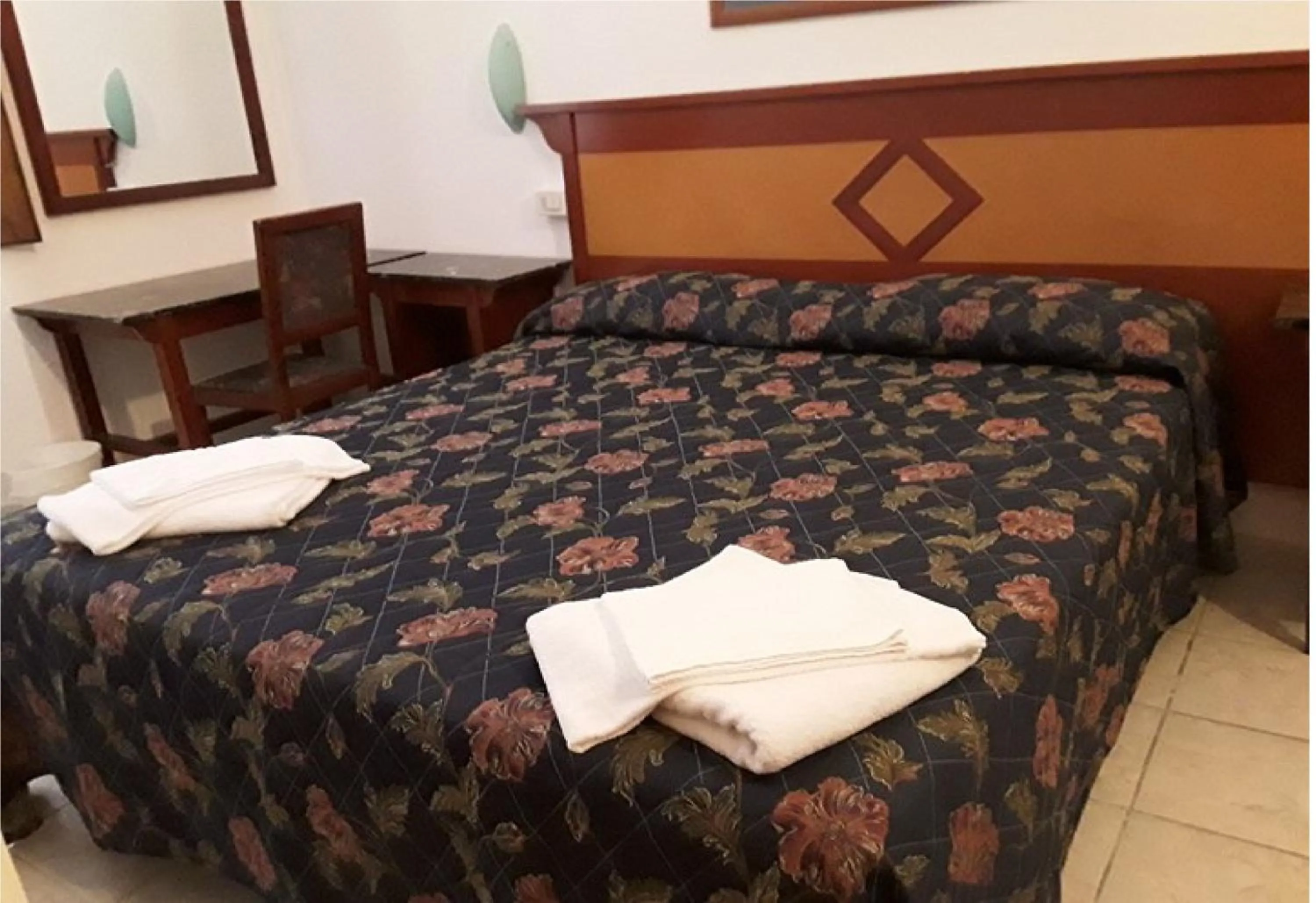 Bed in HOTEL MAIDA