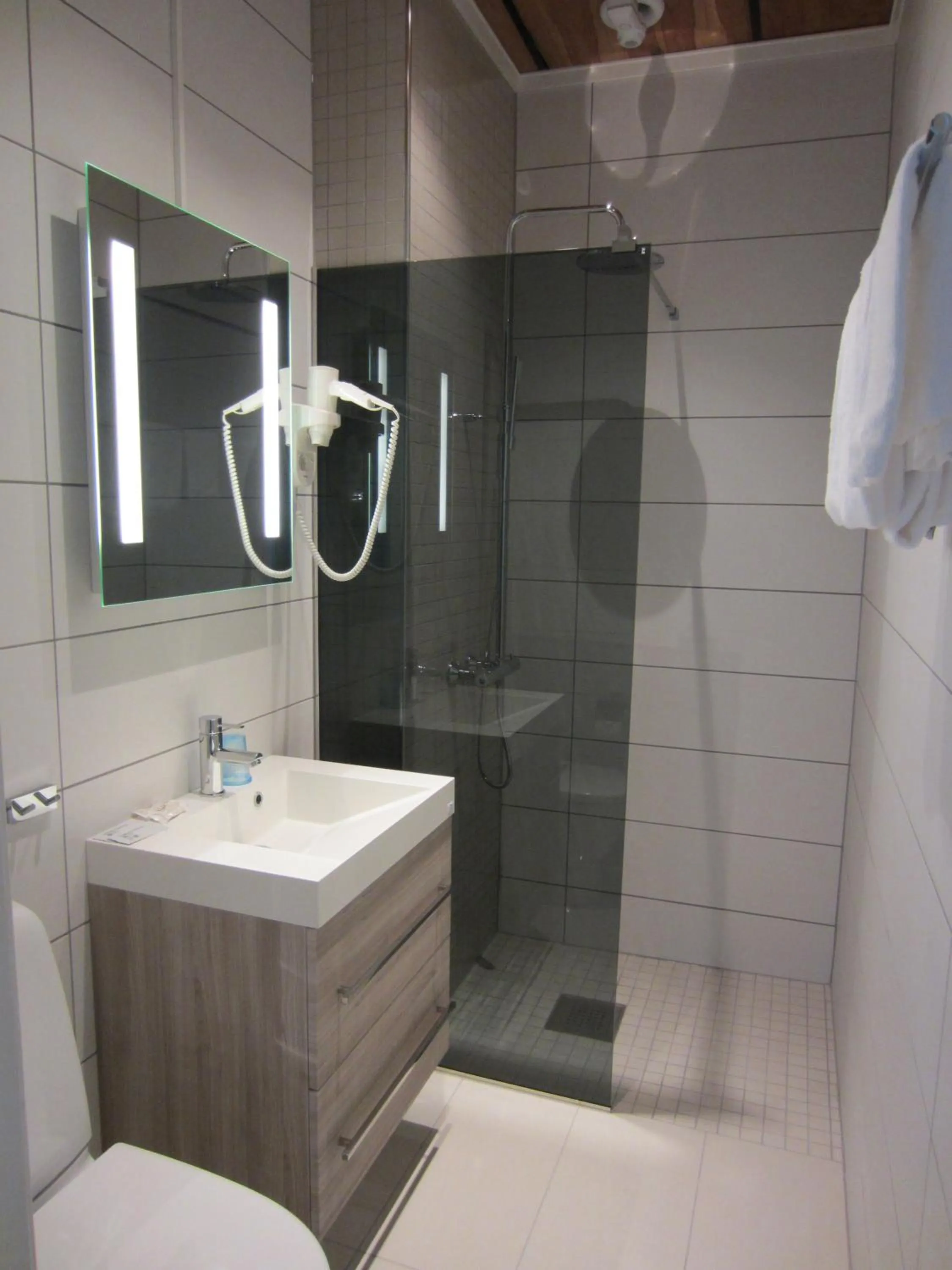 Shower in Moss Hotel & Apartments