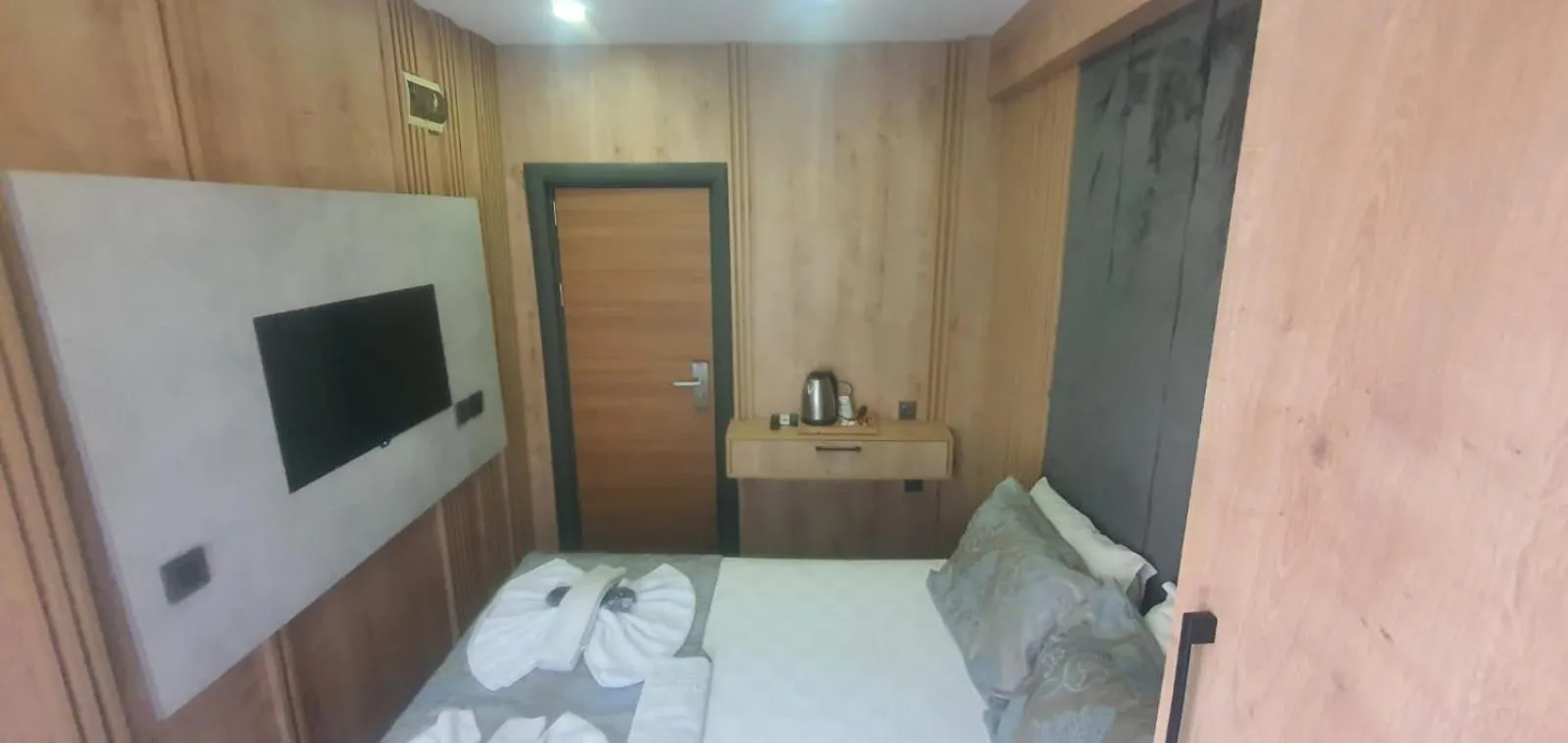 Bed in Grand Esen Hotel