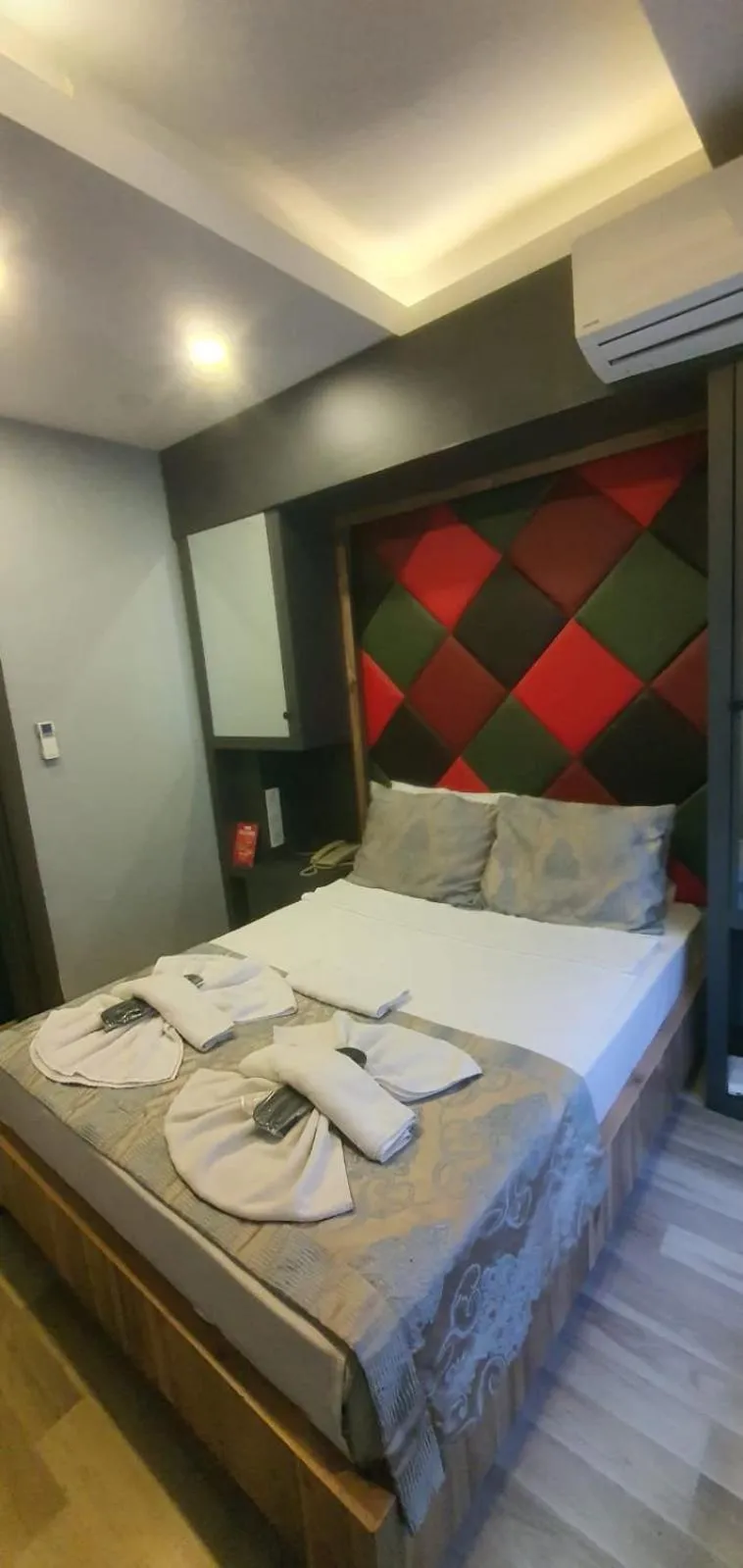 Bed in Grand Esen Hotel