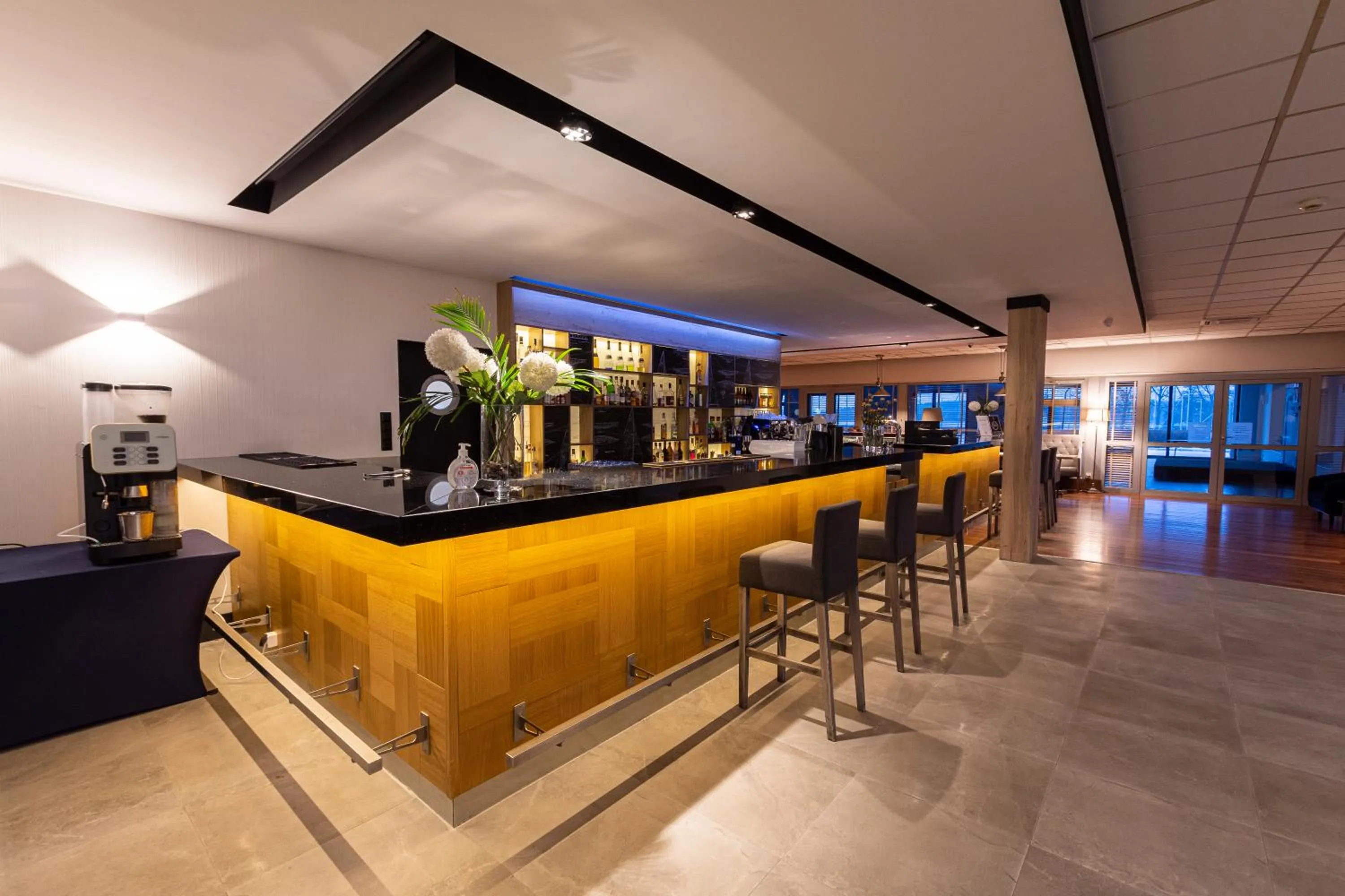 Lounge or bar in Omega Hotel