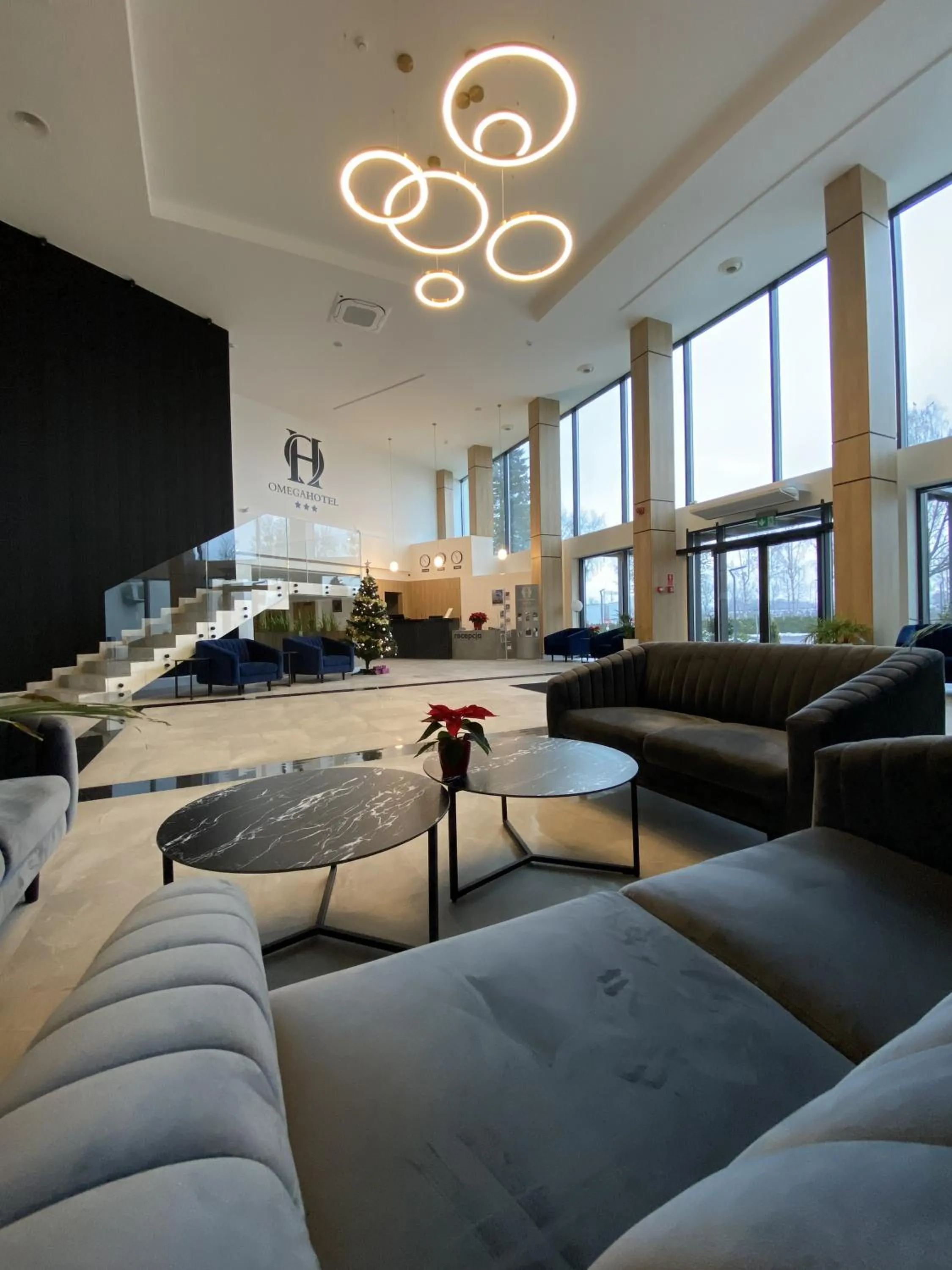 Lobby or reception in Omega Hotel